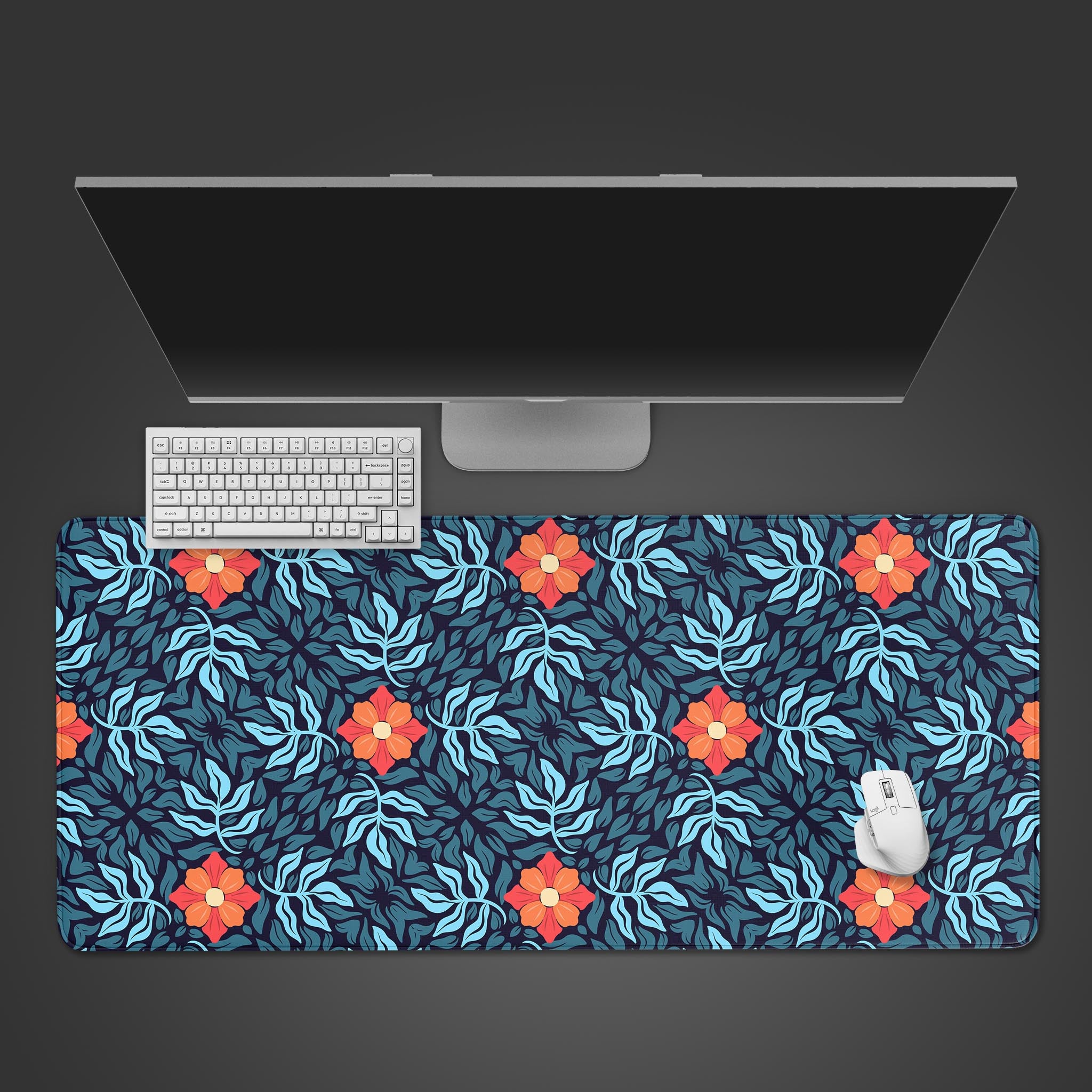Floral desk mat with vibrant orange poppies and blue leaves. Top-down view on a desk with a white keyboard and mouse. - Epic Design Pads & Mousepads