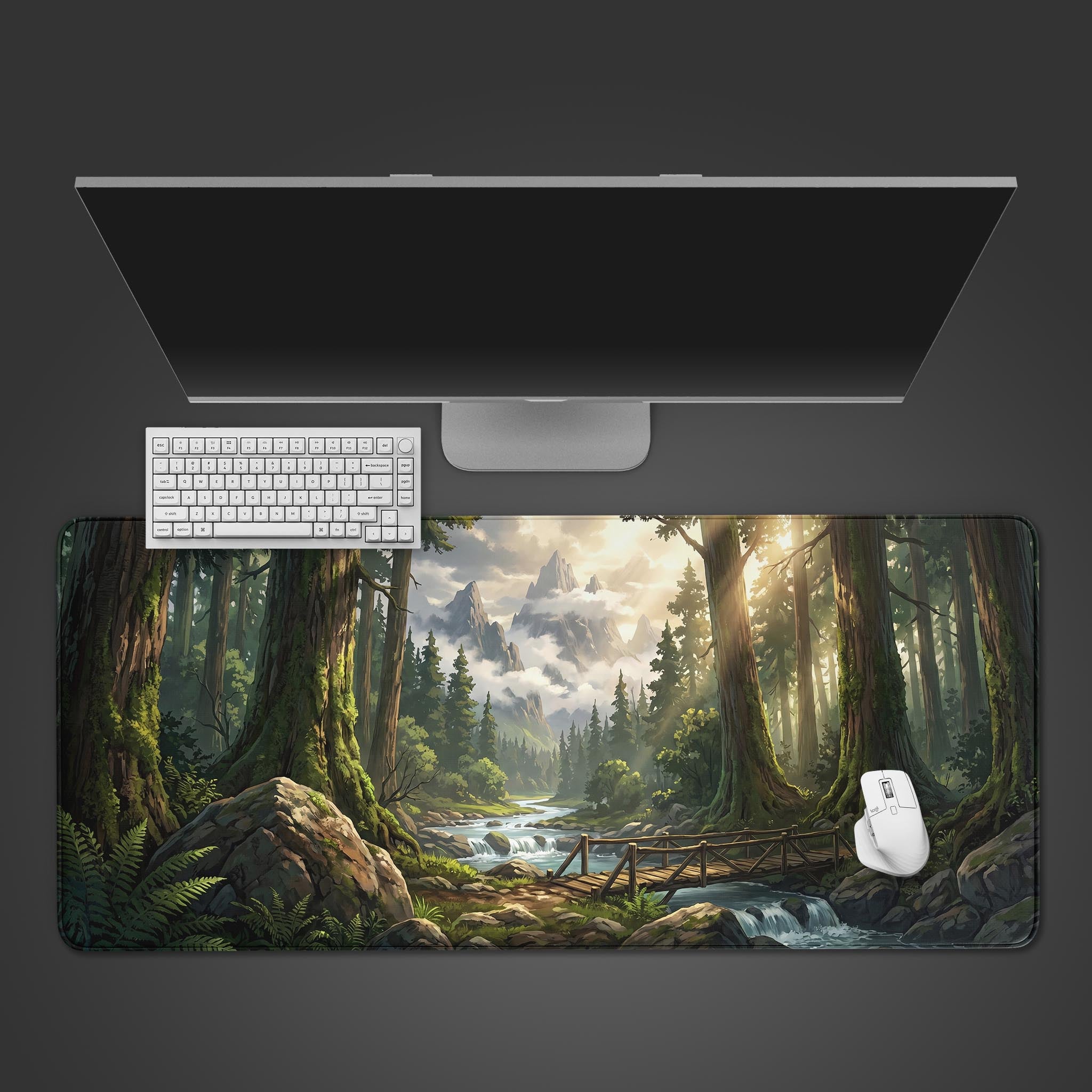 Large gaming desk mat featuring a lush green forest, towering trees, and a wooden bridge crossing a river.