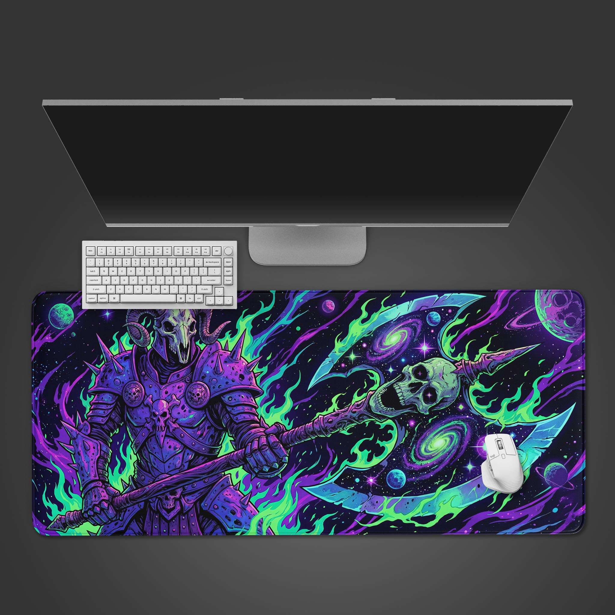 Top-down view of the Galactic Warlord gaming desk mat featuring a cosmic warrior, shown with a white keyboard, mouse, and monitor on a dark desk. - Epic Design Pads & Mousepads