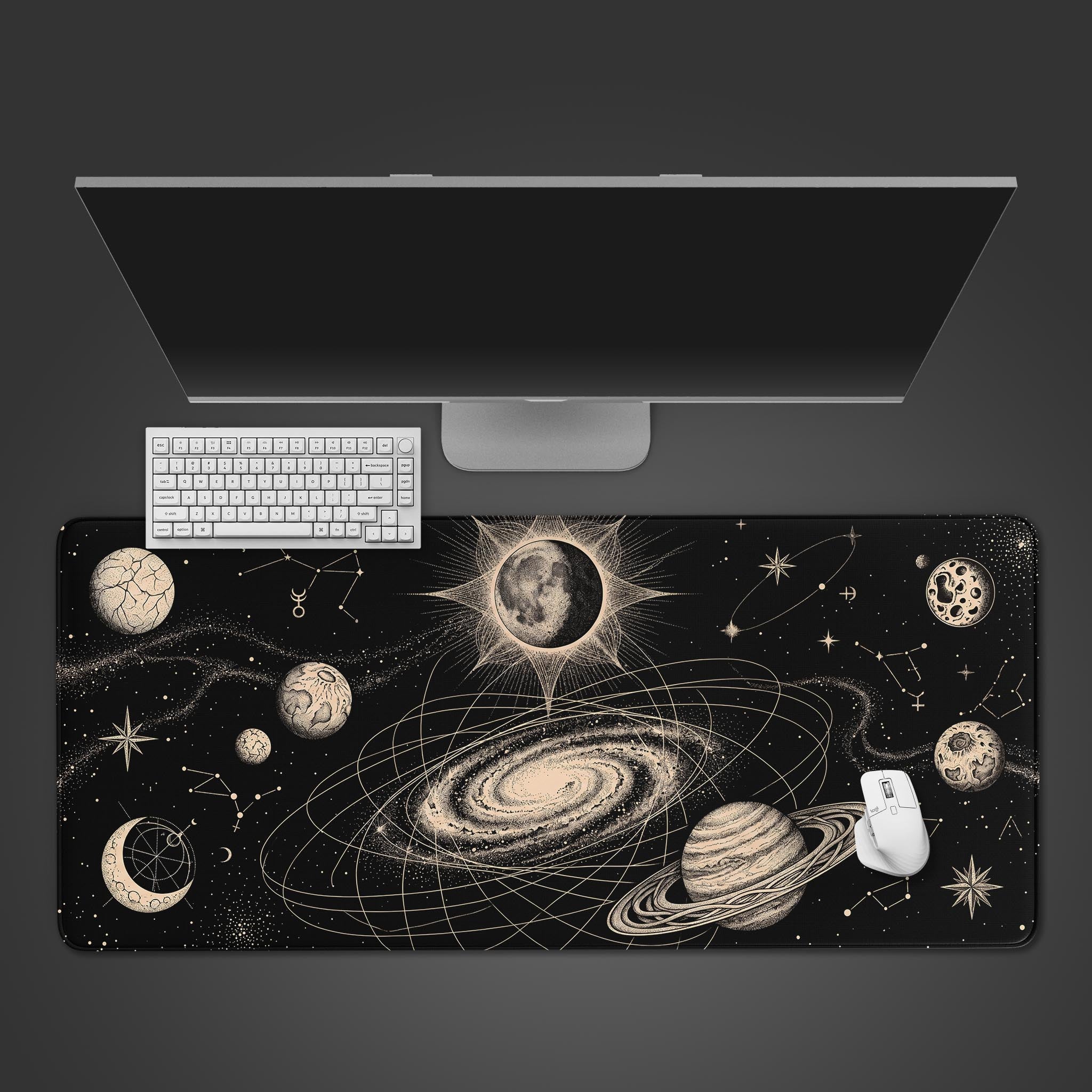 Astral Cosmos vintage celestial desk mat featuring a swirling galaxy, planets, and constellations on a black background