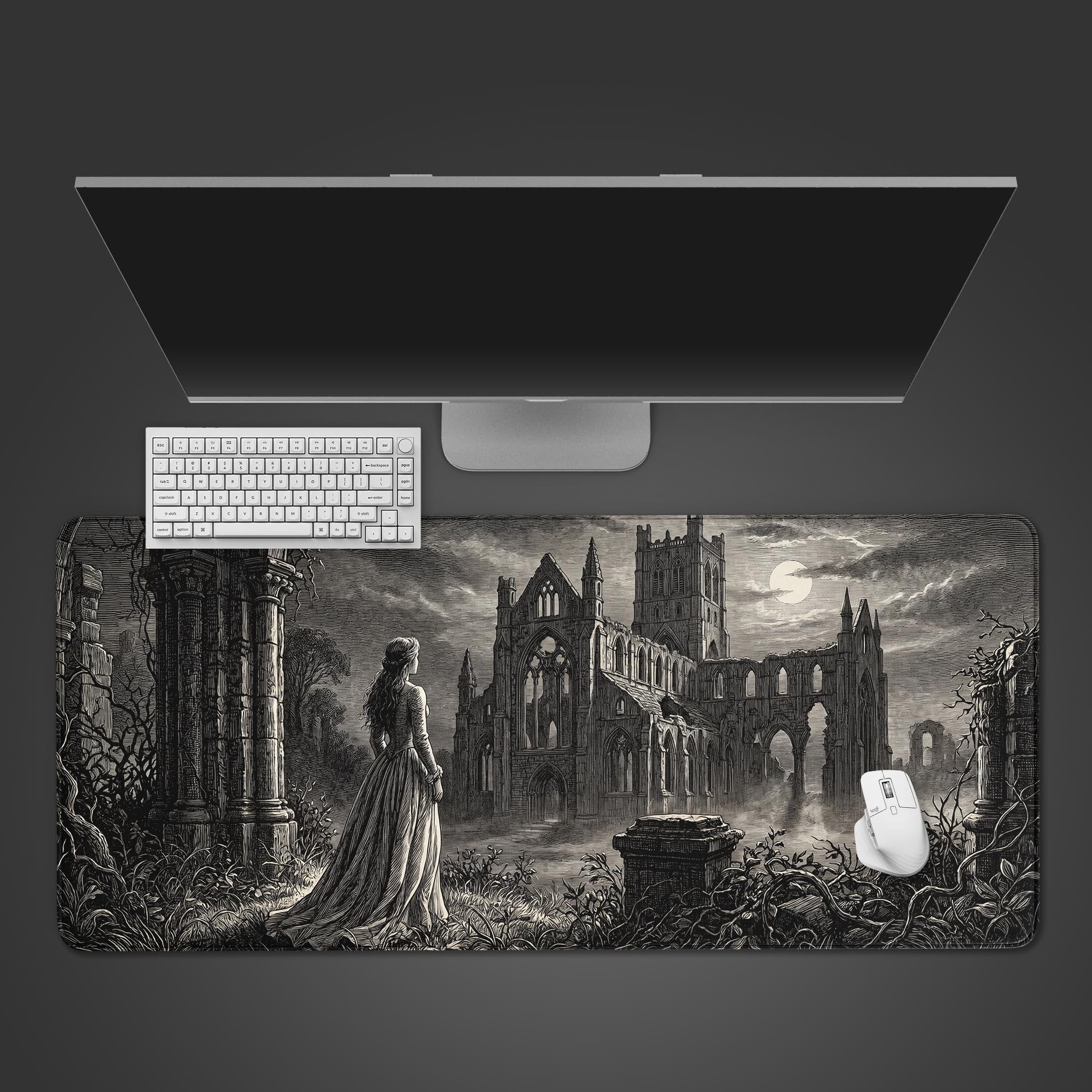 Gothic Abbey Ruins desk mat featuring a vintage engraving of a woman and a ruined cathedral under a full moon