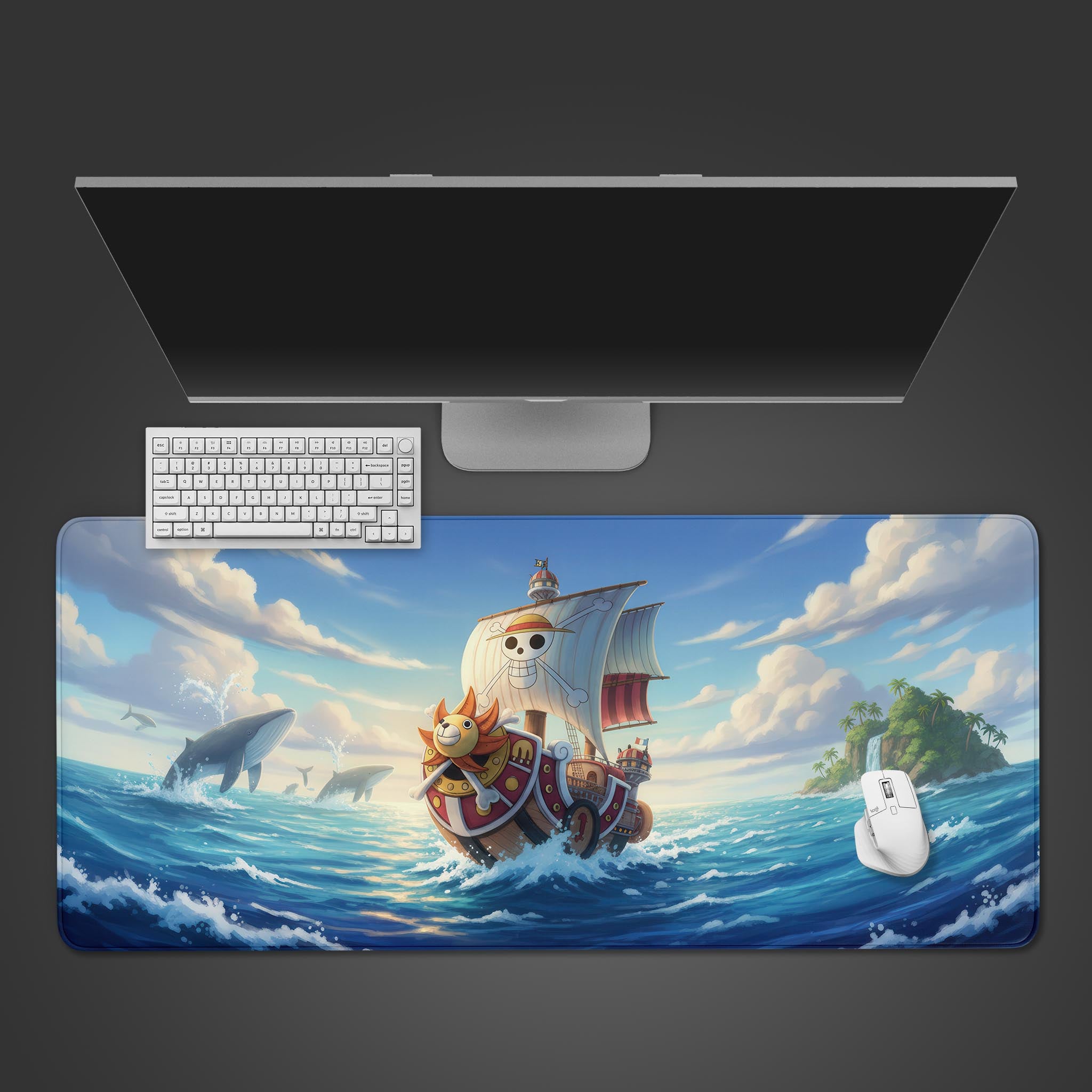 Grand Voyage desk mat with pirate ship and whale design, shown from a top-down view with a white keyboard and mouse. - Epic Design Pads