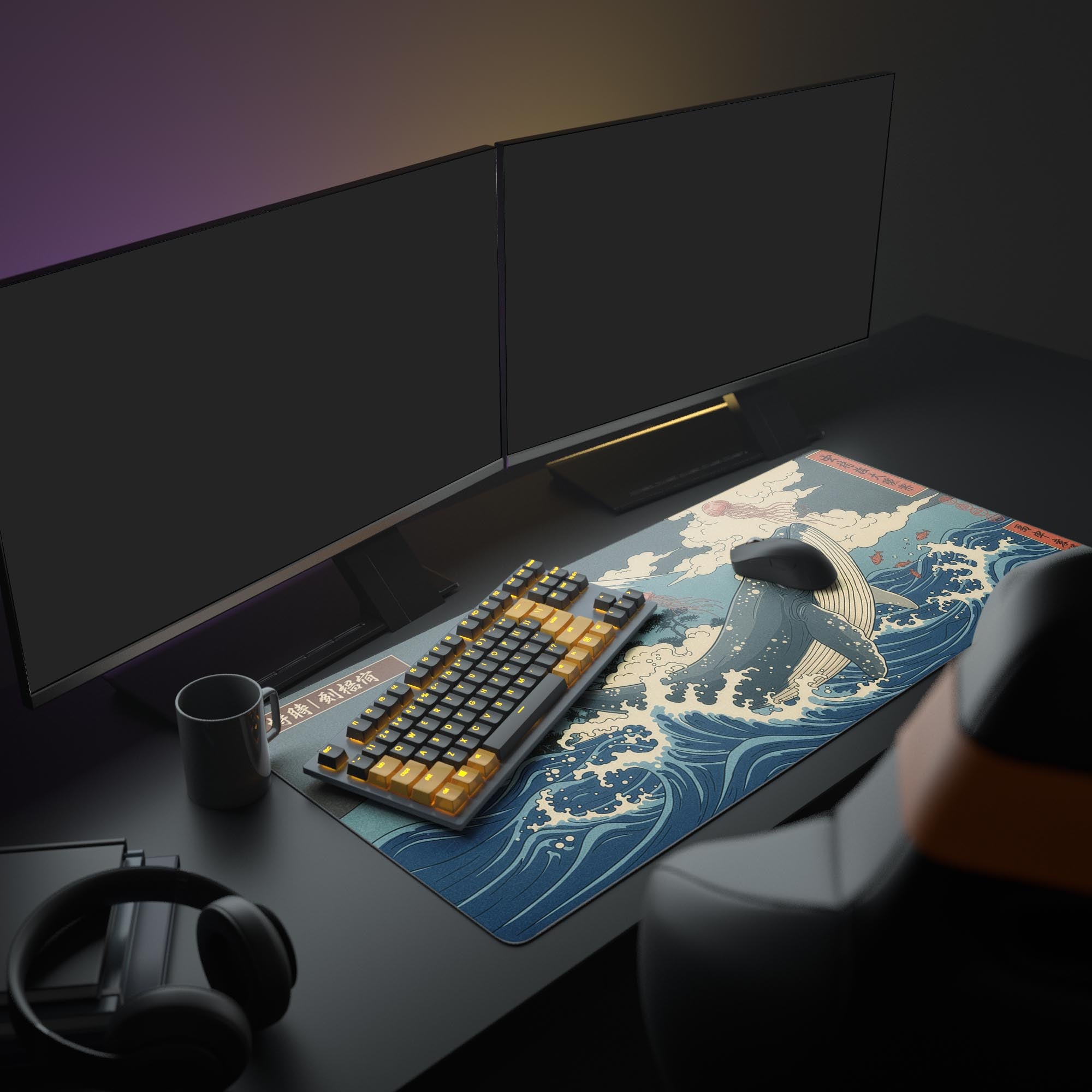 Large Japanese Ukiyo-e gaming desk mat with Great Whale design. Shown in a full desk setup with dual monitors, a mechanical keyboard, and headphones. - Epic Design Pads & Mousepads