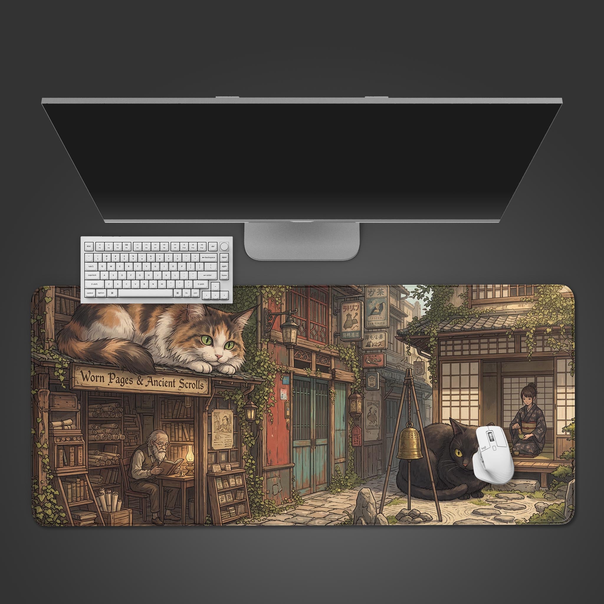 Top-down view of the Guardian Cats Gaming Desk Mat featuring a Japanese alley scene, shown with a white keyboard and monitor on a dark surface. - Epic Design Pads & Mousepads