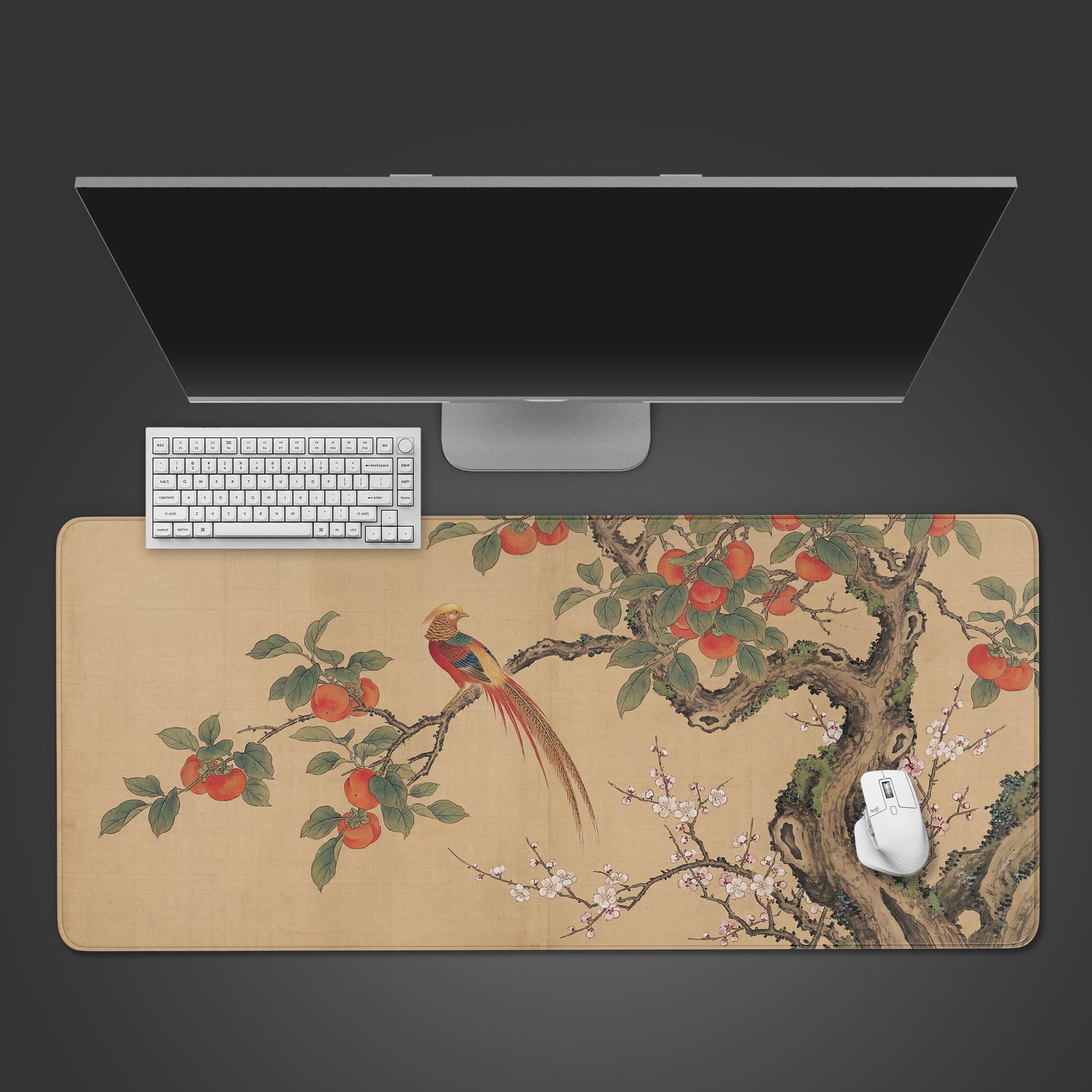 Top-down view of the Imperial Harvest gaming desk mat featuring a Chinese art style with a pheasant and persimmons, shown with a white keyboard and mouse. - Epic Design Pads & Mousepads