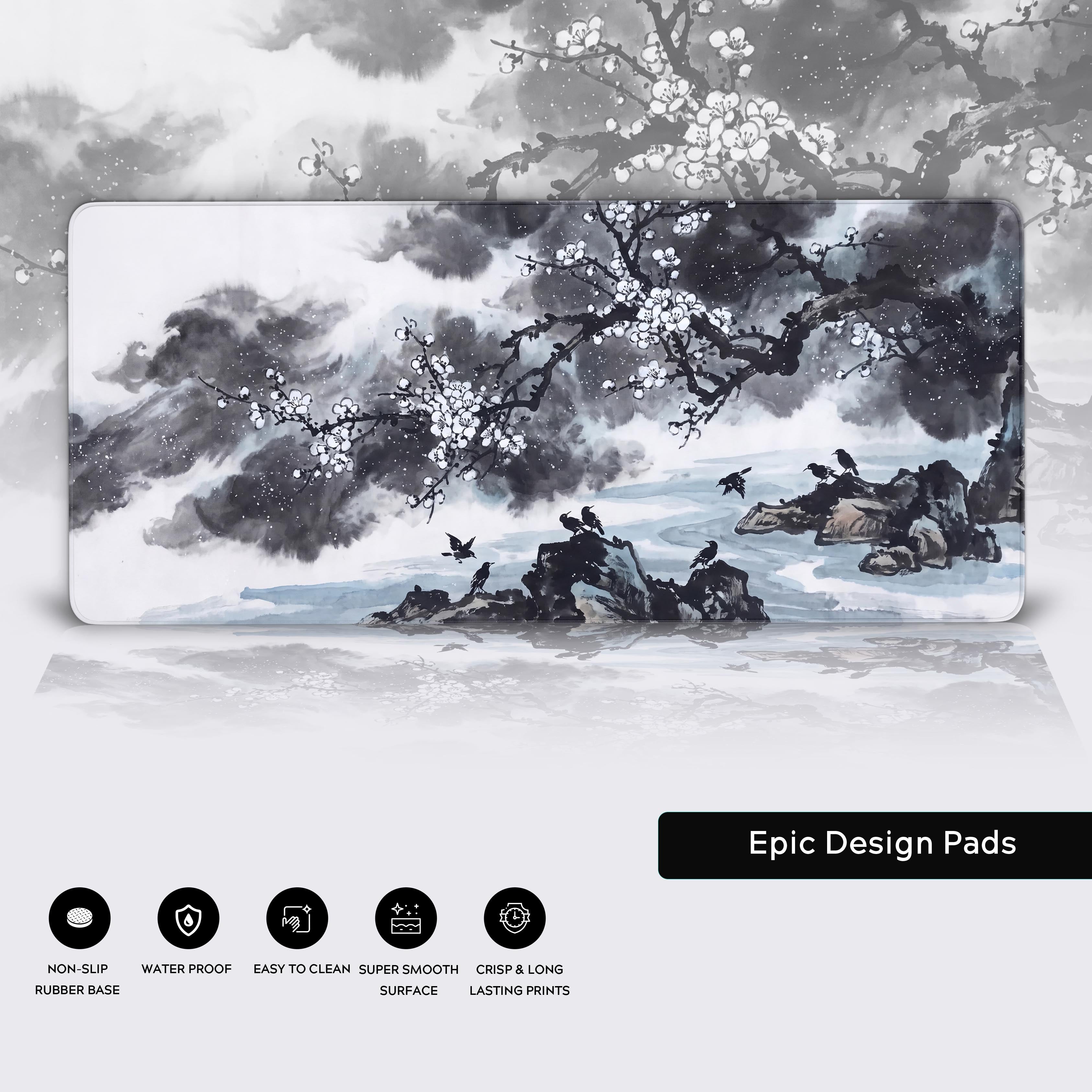 Graphic showing the monochrome ink wash desk mat floating above a reflective white surface with marketing feature icons.