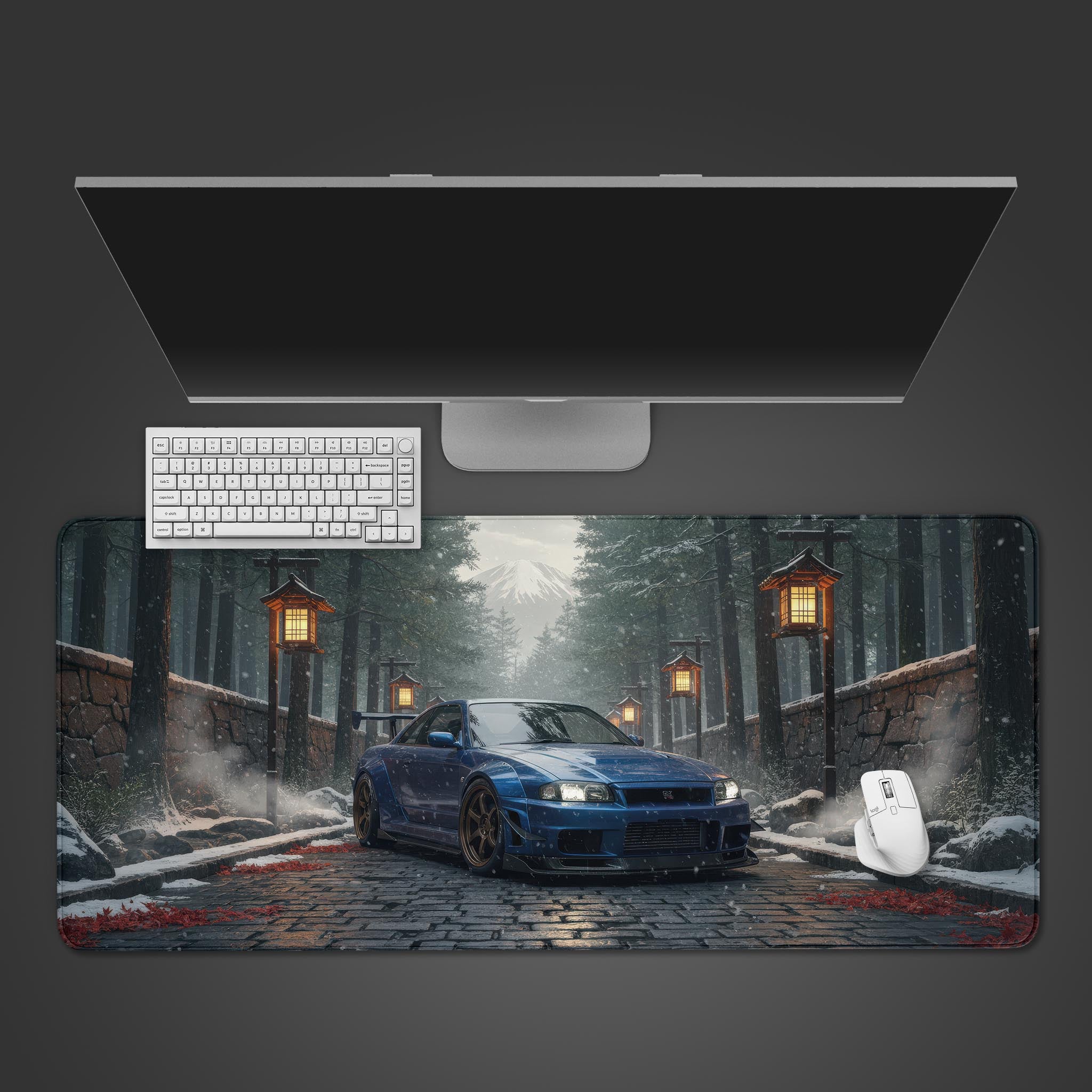 JDM Legend gaming desk mat with a blue car in a Japanese winter scene – top-down view with keyboard and mouse. - Epic Design Pads