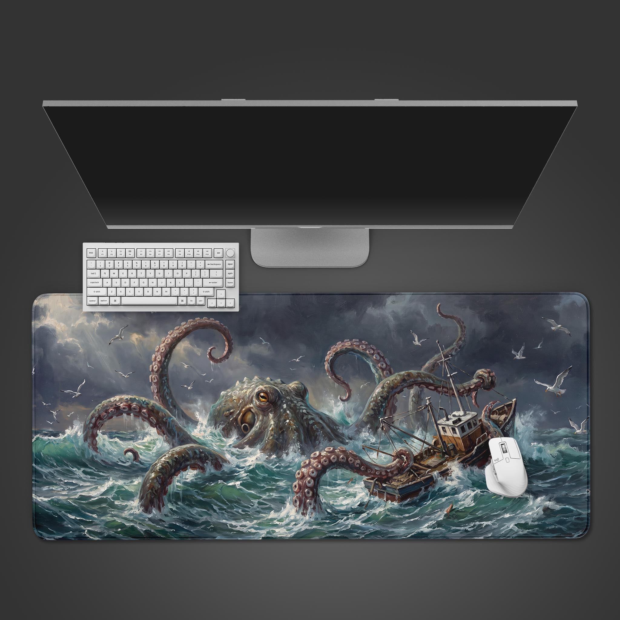 Wide view of a stormy ocean desk mat featuring a giant kraken attacking a small boat.