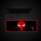 Gaming setup with a custom logo mouse pad on a dark surface