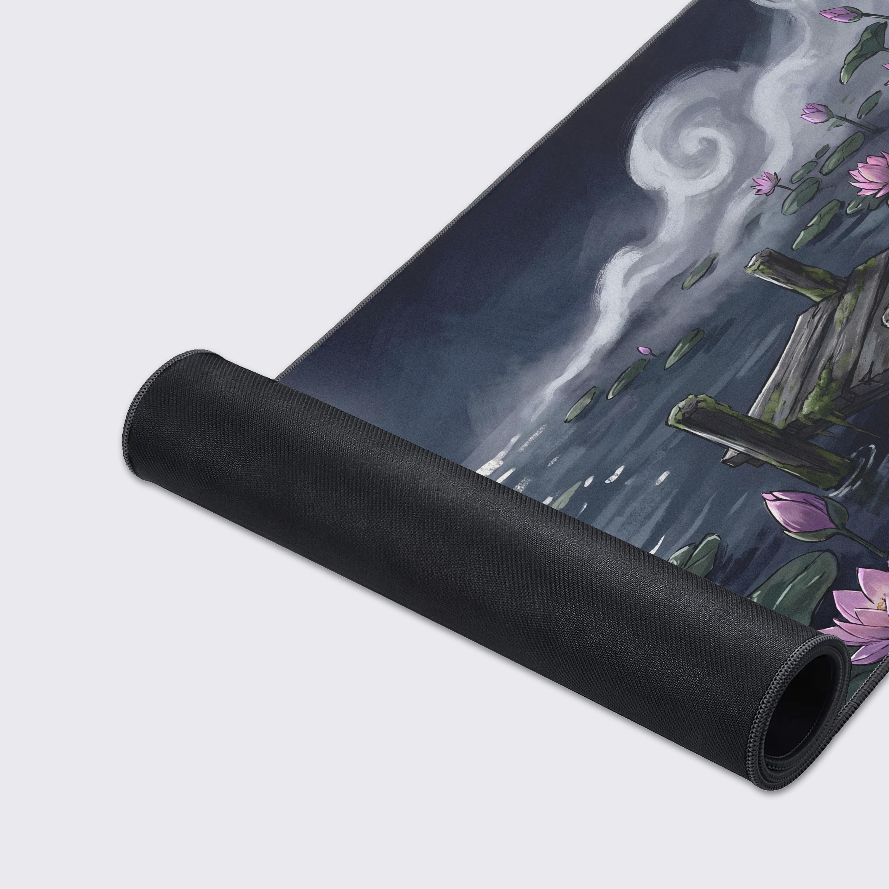 Ethereal night landscape desk mat showing water, glowing moon, and water lilies with waterproof and non-slip feature icons