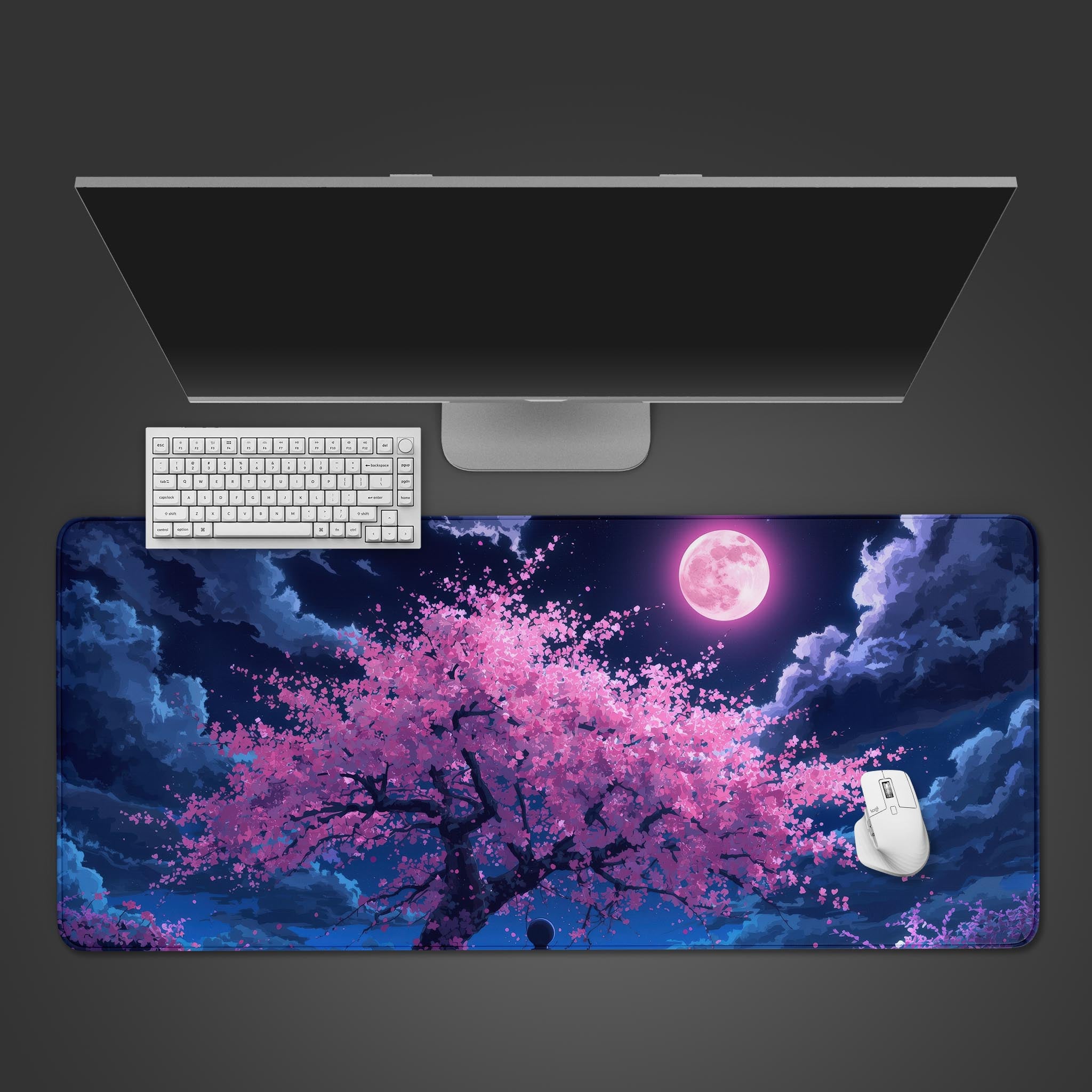 Lunar Blossom desk mat with cherry blossom and pink moon design – top-down view on a desk with a white keyboard and mouse. - Epic Design Pads & Mousepads