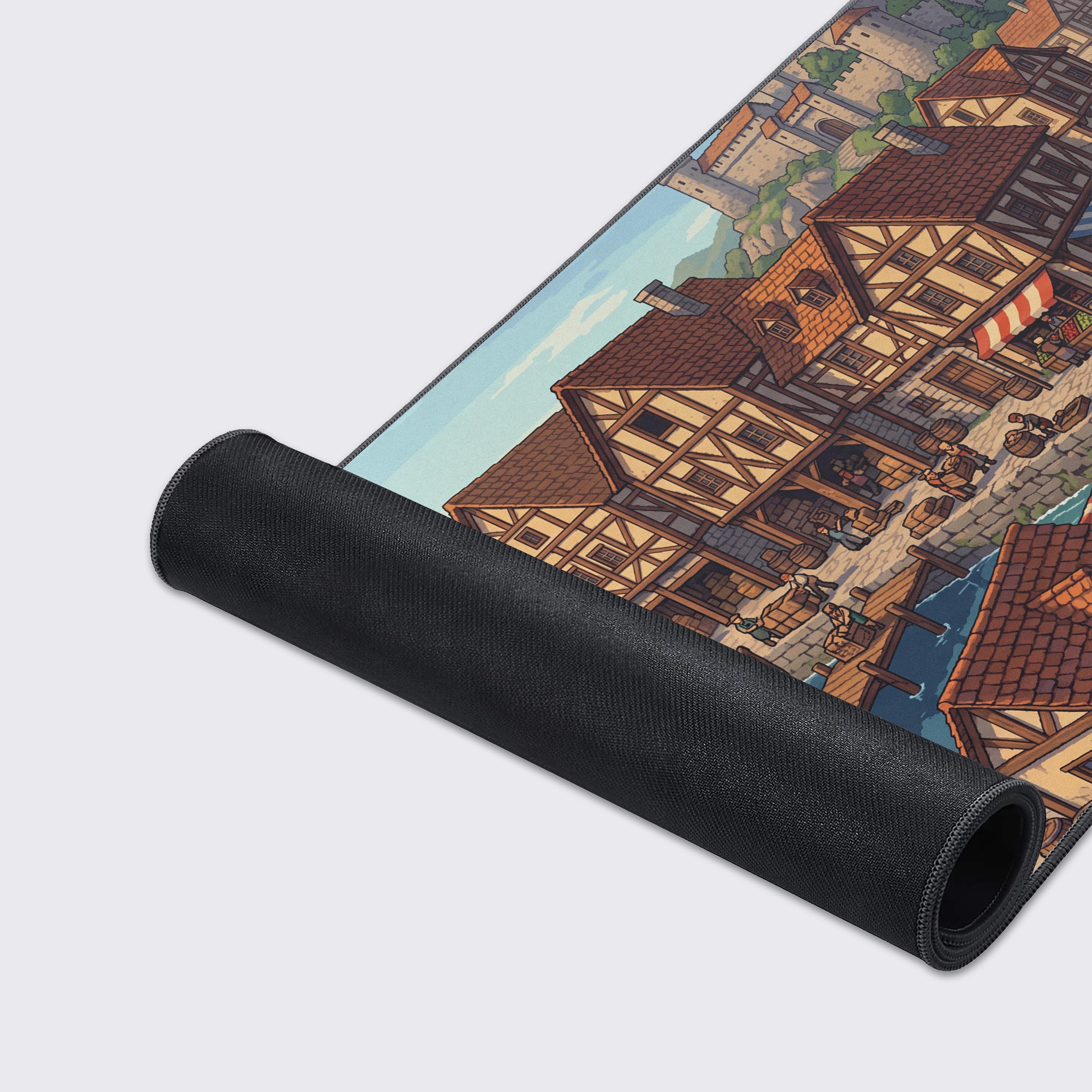 Top-down view of the medieval harbor desk mat highlighting the smooth glide surface and castle background