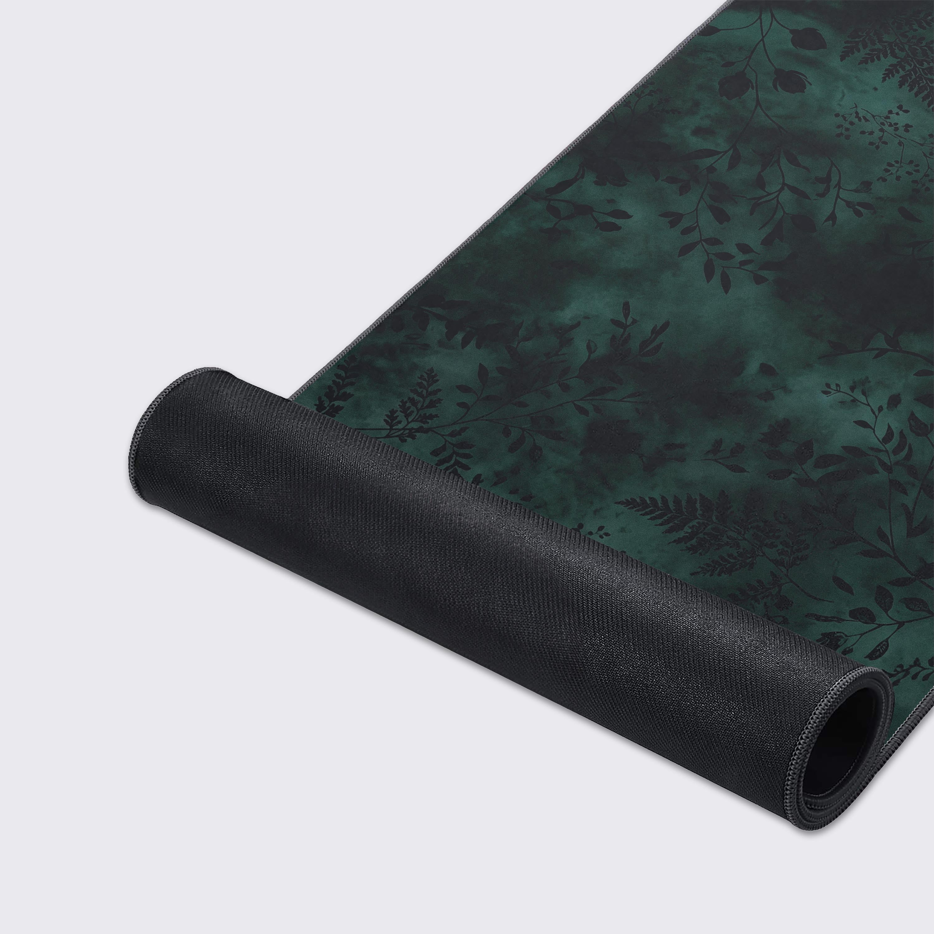 Close-up of the waterproof and smooth surface of the moody floral gaming mat