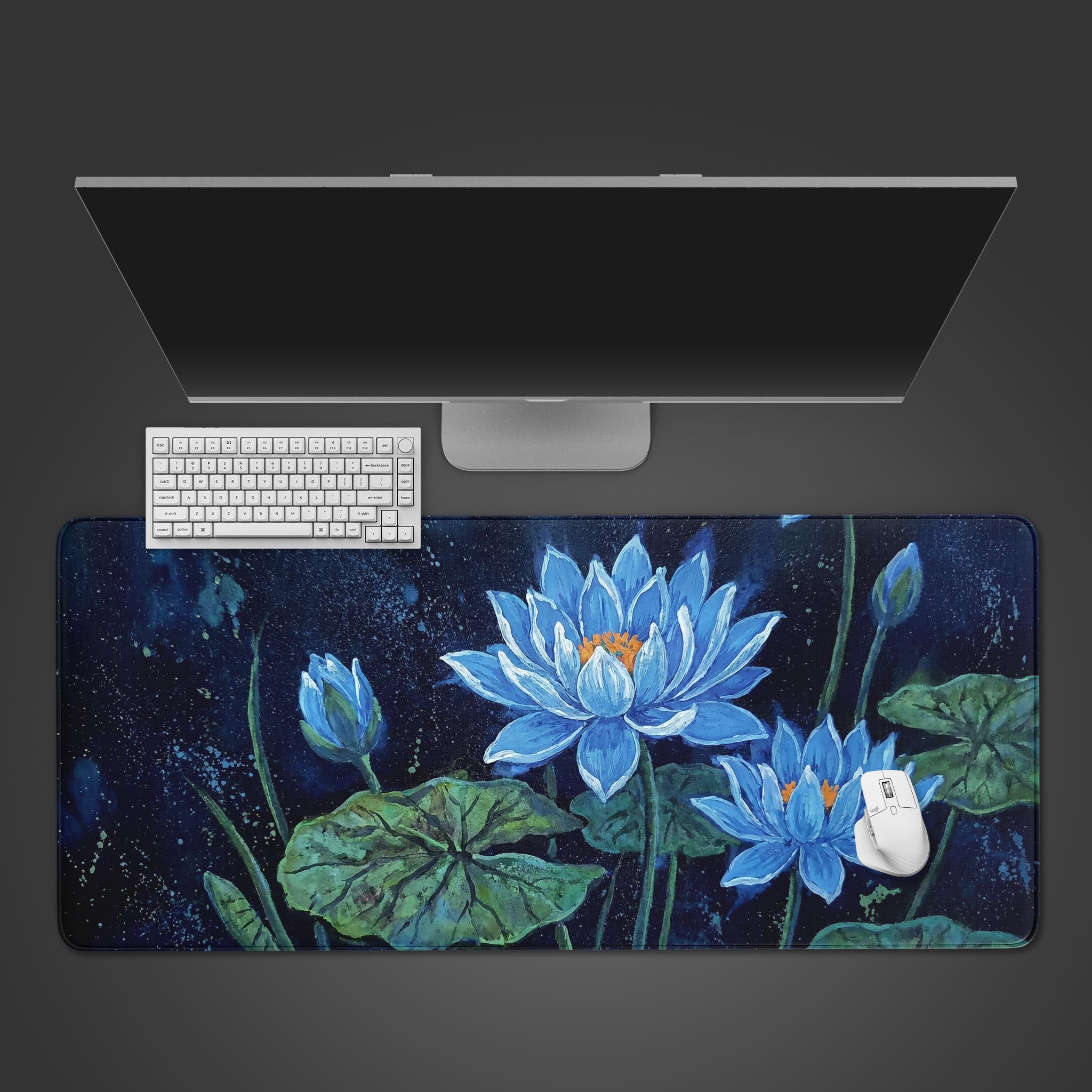 Midnight Lotus desk mat with blue floral art shown in a top-down view with a mechanical keyboard and white mouse, creating a clean and focused workspace. - Epic Design Pads & Mousepads