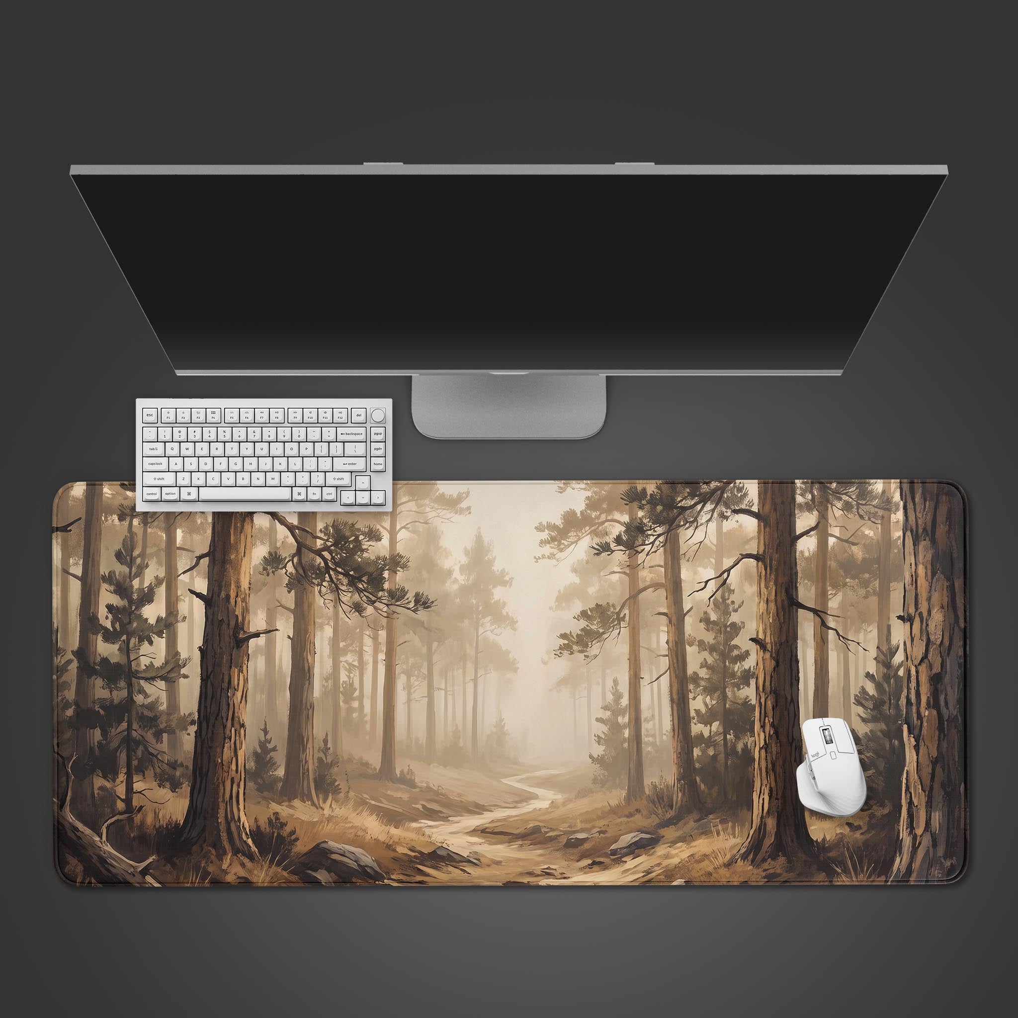 A desk mat featuring a sepia-toned illustration of a misty pine forest with a winding trail.