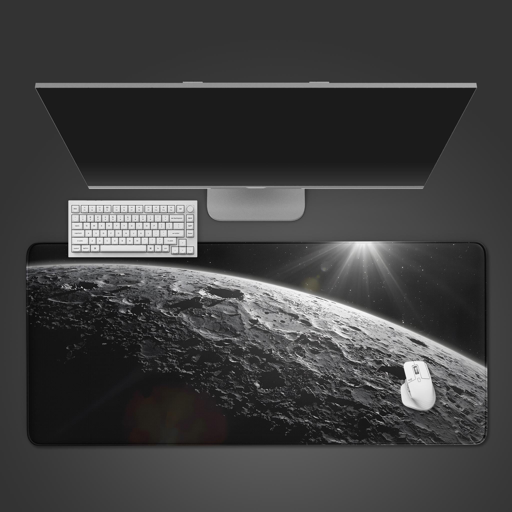 Monochrome Moon Surface desk mat with a detailed lunar horizon – top-down view with a black keyboard and mouse. - Epic Design Pads & Mousepads