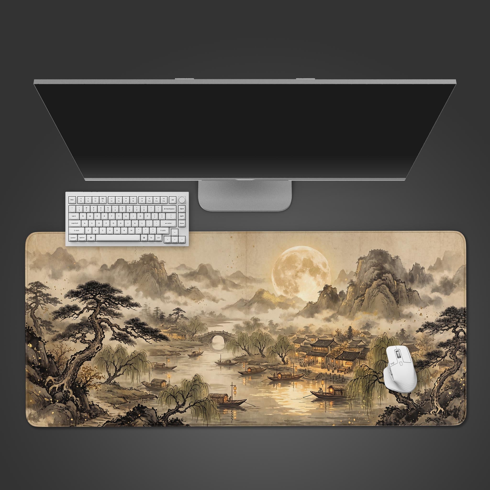 A large desk mat featuring a traditional ink wash painting of a moonlit river village and misty mountains.