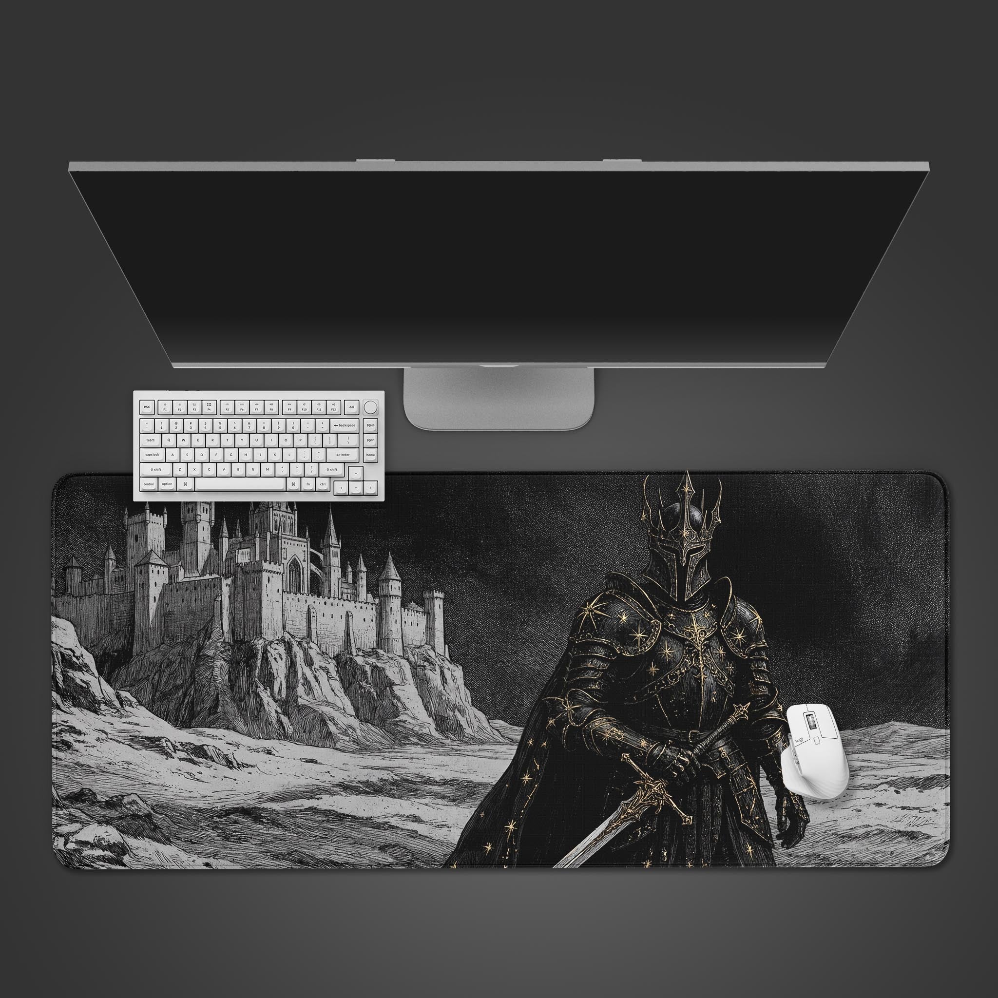 Top-down view of the Obsidian Sovereign gaming desk mat, featuring a dark knight and castle, with a white keyboard and mouse on top. - Epic Design Pads & Mousepads