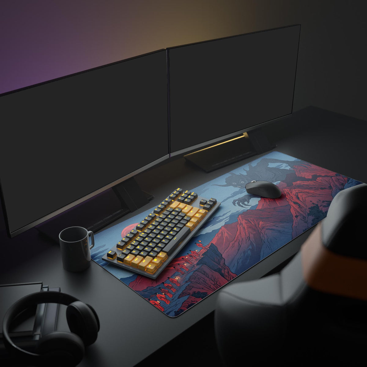 Desk mat on a dark desk with two monitors, keyboard, mouse, mug and headphones; horned demon over red mountains