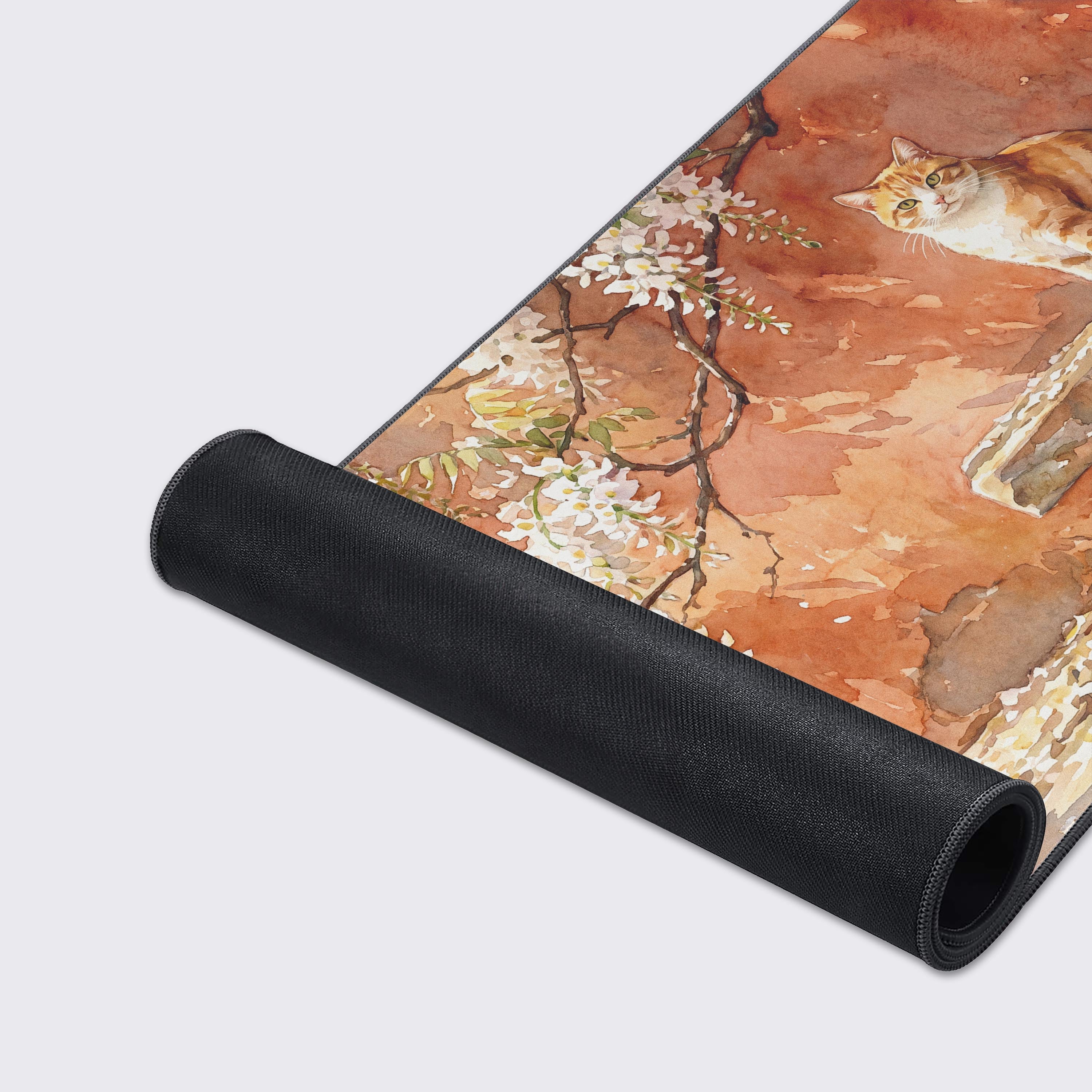Waterproof, easy to clean, and anti-slip rubber base features of the orange cat desk pad