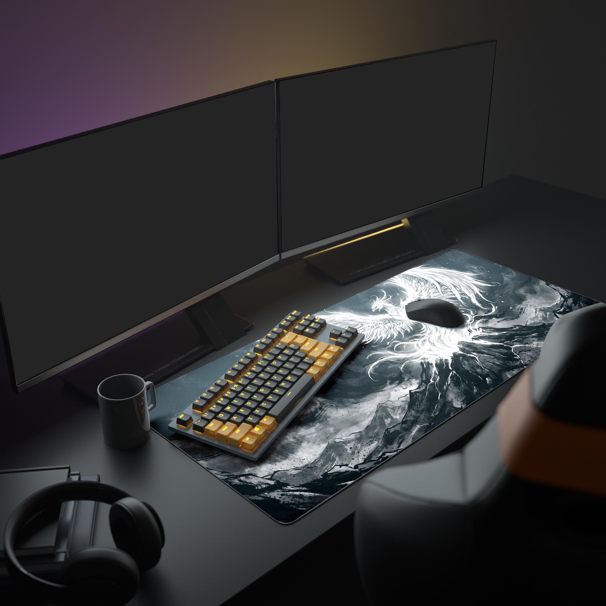 Close-up of the glowing white phoenix design and dark mountain peaks on the large gaming mouse pad.