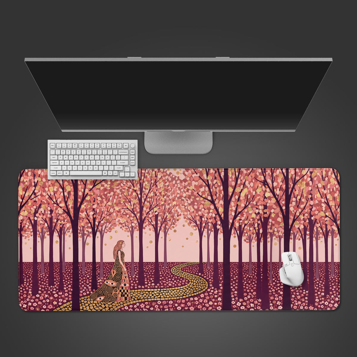 Pink gustav klimt vintage desk mat from above with white keyboard and mouse: a woman on a gold path in a pink orchard