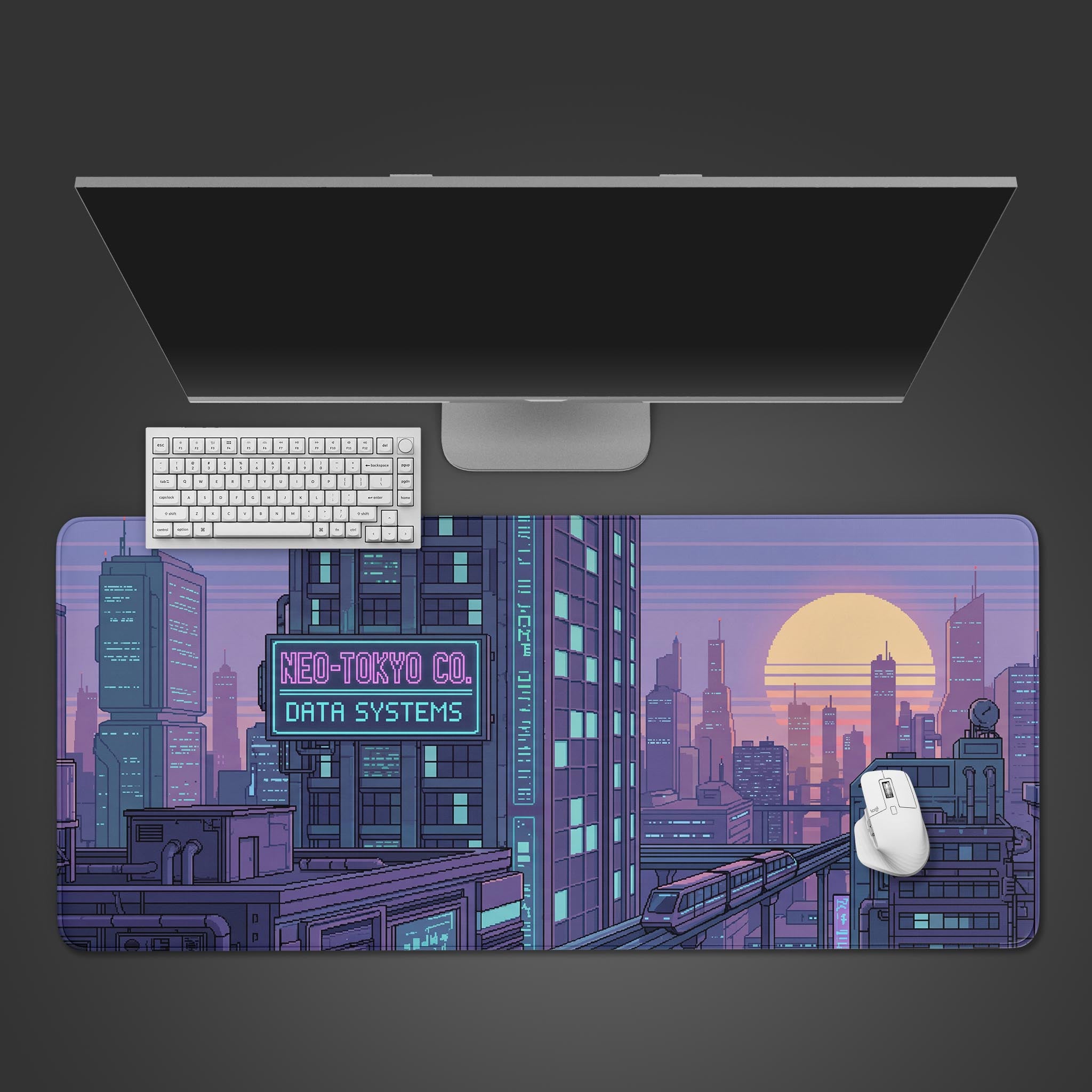 A wide desk mat displaying a pixel art cityscape of Pixel Metropolis with purple and blue buildings at sunset.