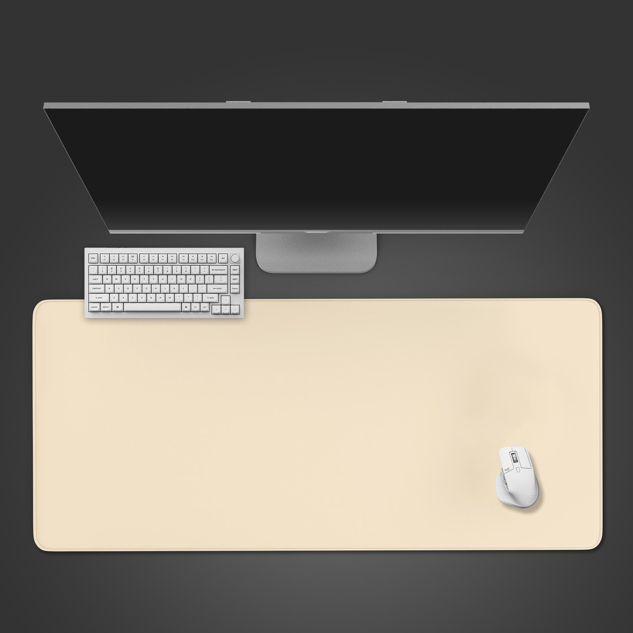 A top-down view of the Plain Neutral cream gaming desk mat, shown with a minimalist white keyboard and mouse on a dark background. - Epic Design Pads & Mousepads