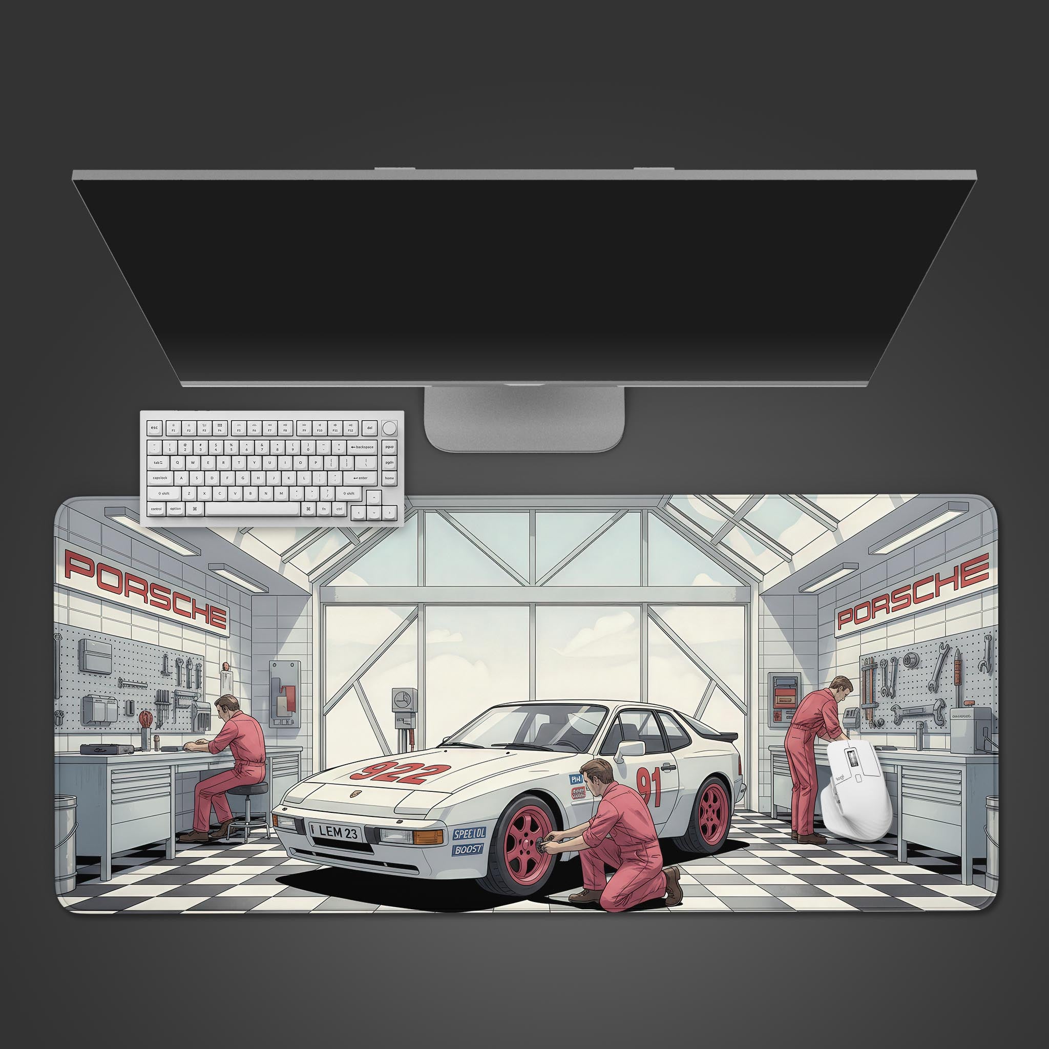 Porsche garage desk mat featuring white Porsche 944 race car with mechanics in a bright workshop - Epic Design Pads & Mousepads