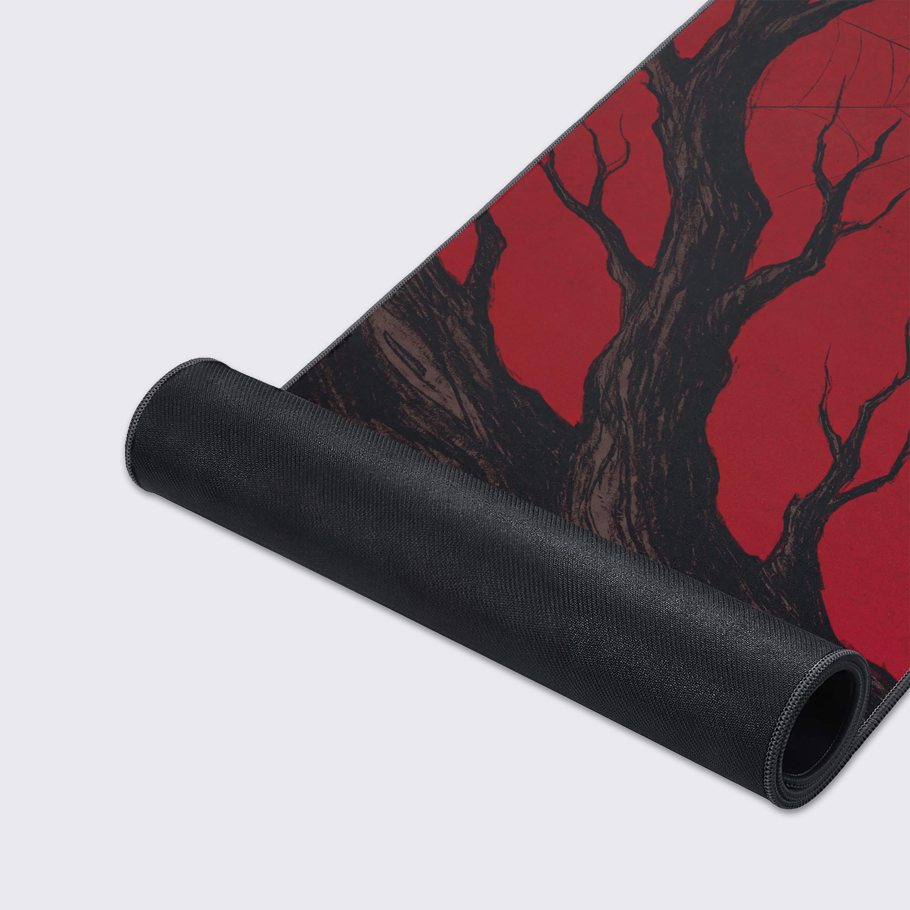 Highlight of the non-slip rubber base and waterproof features of the dark fantasy desk mat.