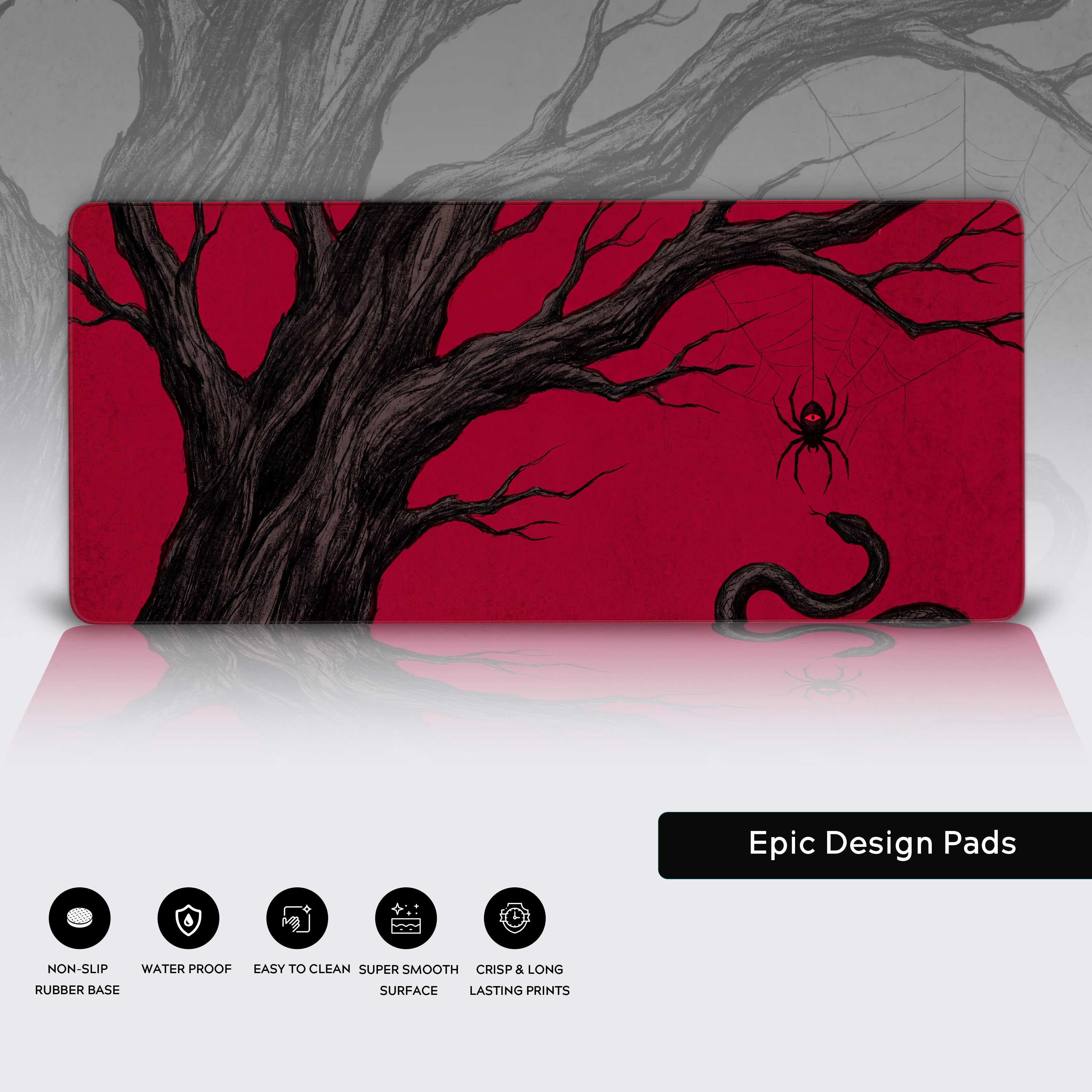 A dream gaming setup elevated by the striking red and black gothic spider desk mat.