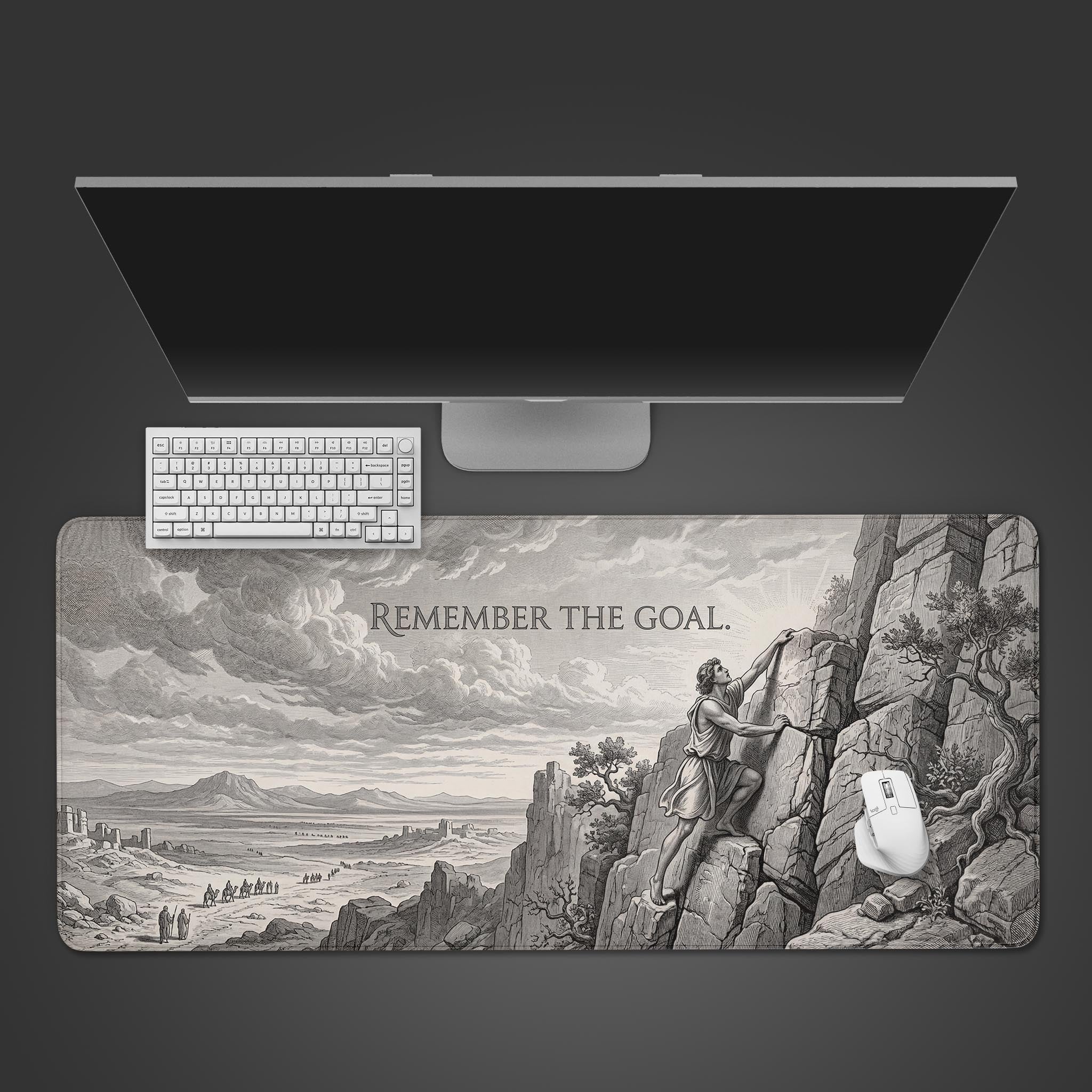 The 'Remember The Goal' gaming desk mat in a top-down view with a white keyboard and mouse, showcasing its vintage monochrome climber design. - Epic Design Pads & Mousepads