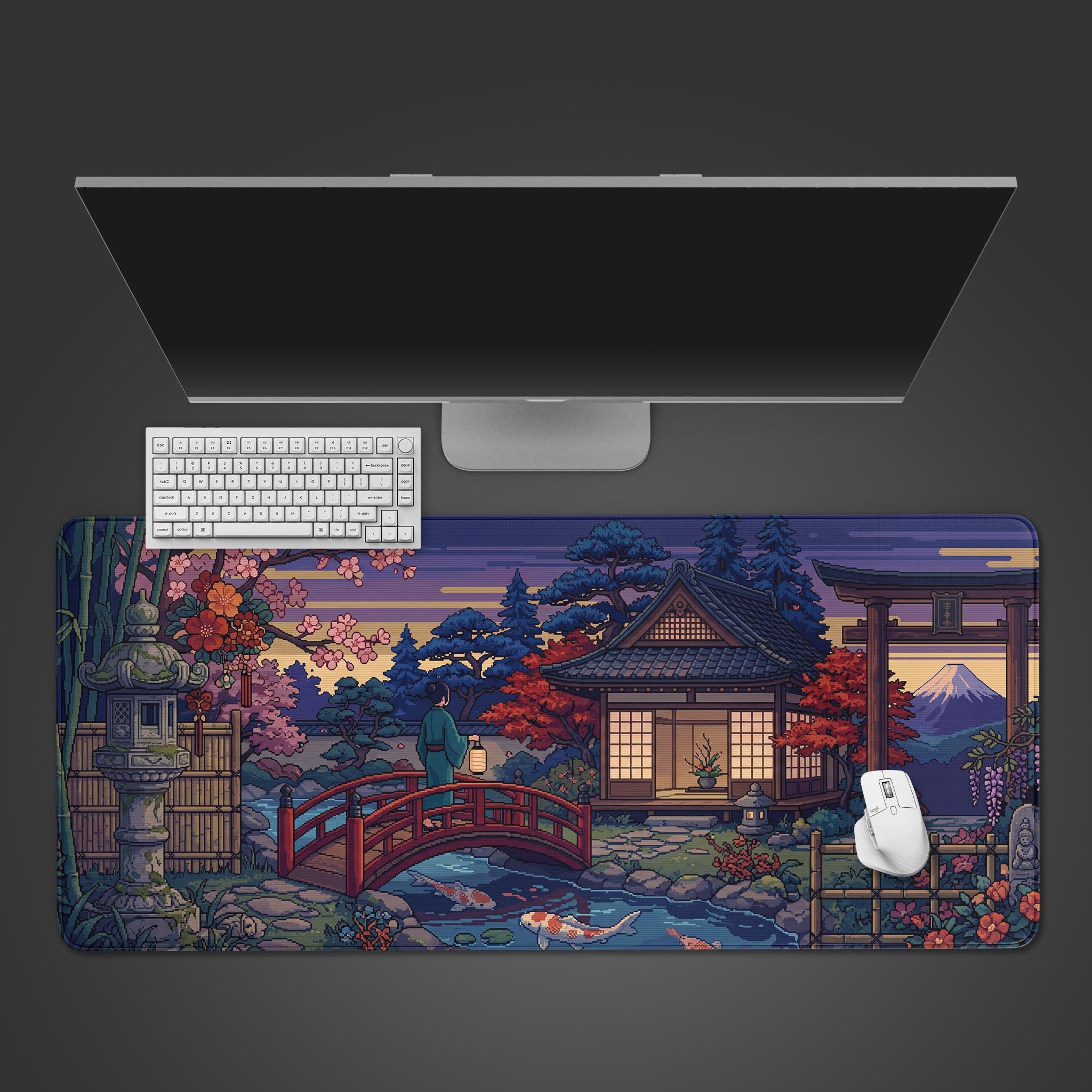 Top-down view of the Retro Garden Gaming Desk Mat featuring a pixel art Japanese garden. A white keyboard and mouse are placed on the mat below a sleek monitor. - Epic Design Pads & Mousepads