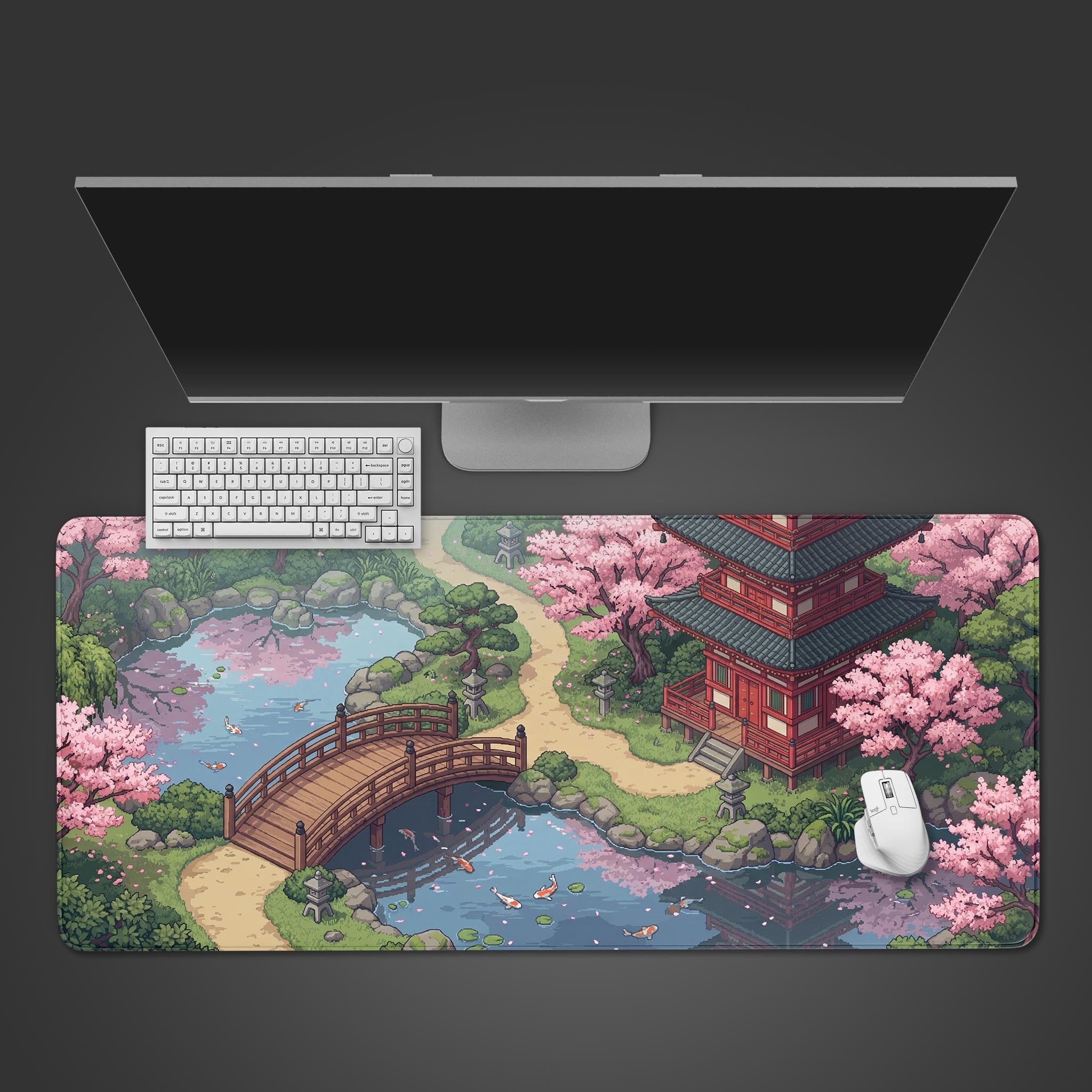 Top-down view of the Retro Sakura Path gaming desk mat, featuring a pixel art Japanese garden with a keyboard, mouse, and monitor. - Epic Design Pads & Mousepads
