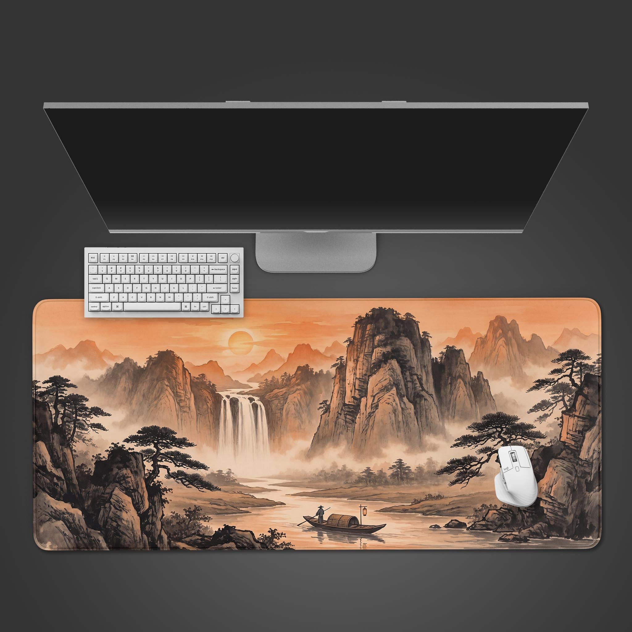 Golden sunset over traditional Chinese ink wash mountain landscape on an extended desk mat