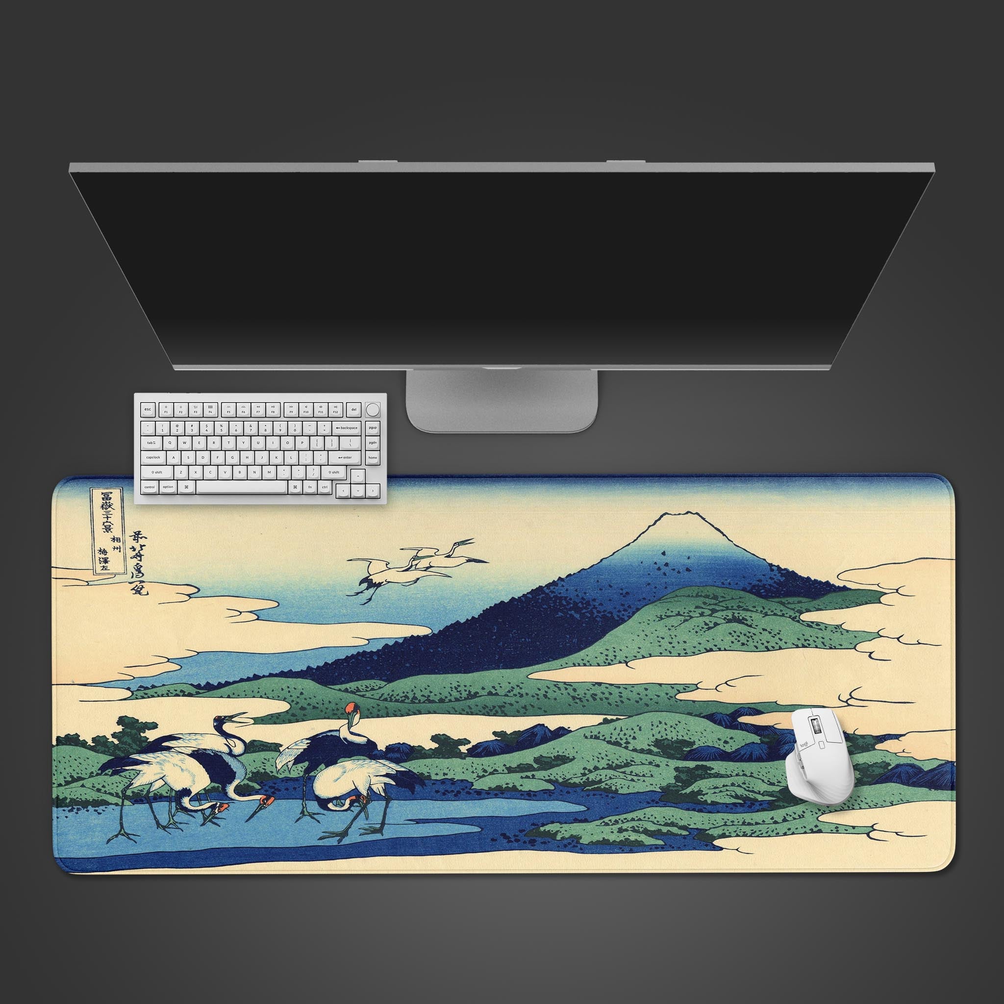 Hokusai desk mat with 'Sagami Province' art. Top-down view on a desk with a white keyboard and mouse, highlighting the crane and Mount Fuji design. - Epic Design Pads & Mousepads