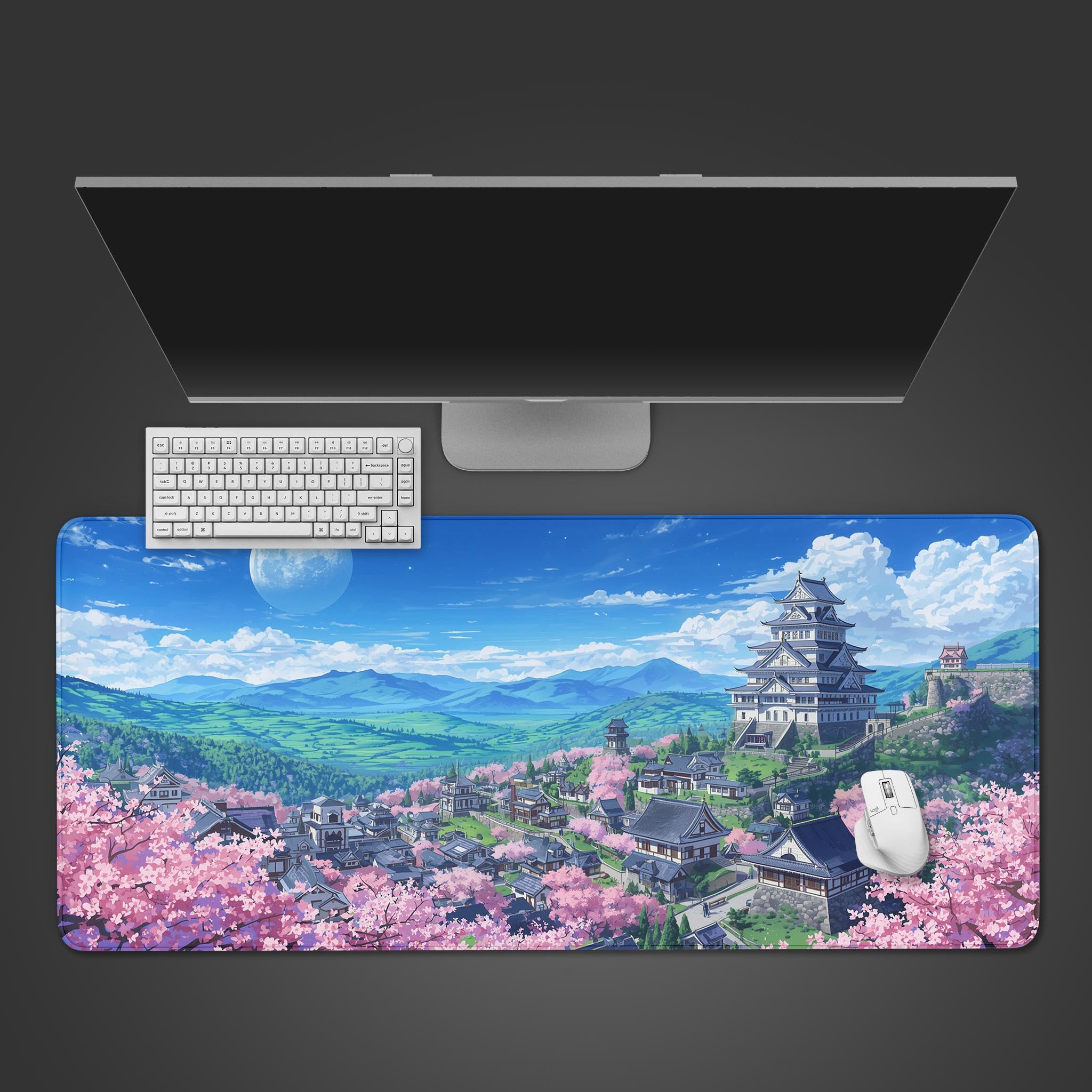 Sakura Castle gaming desk mat with Japanese cherry blossom design – top-down view on a desk with a white keyboard and mouse. - Epic Design Pads
