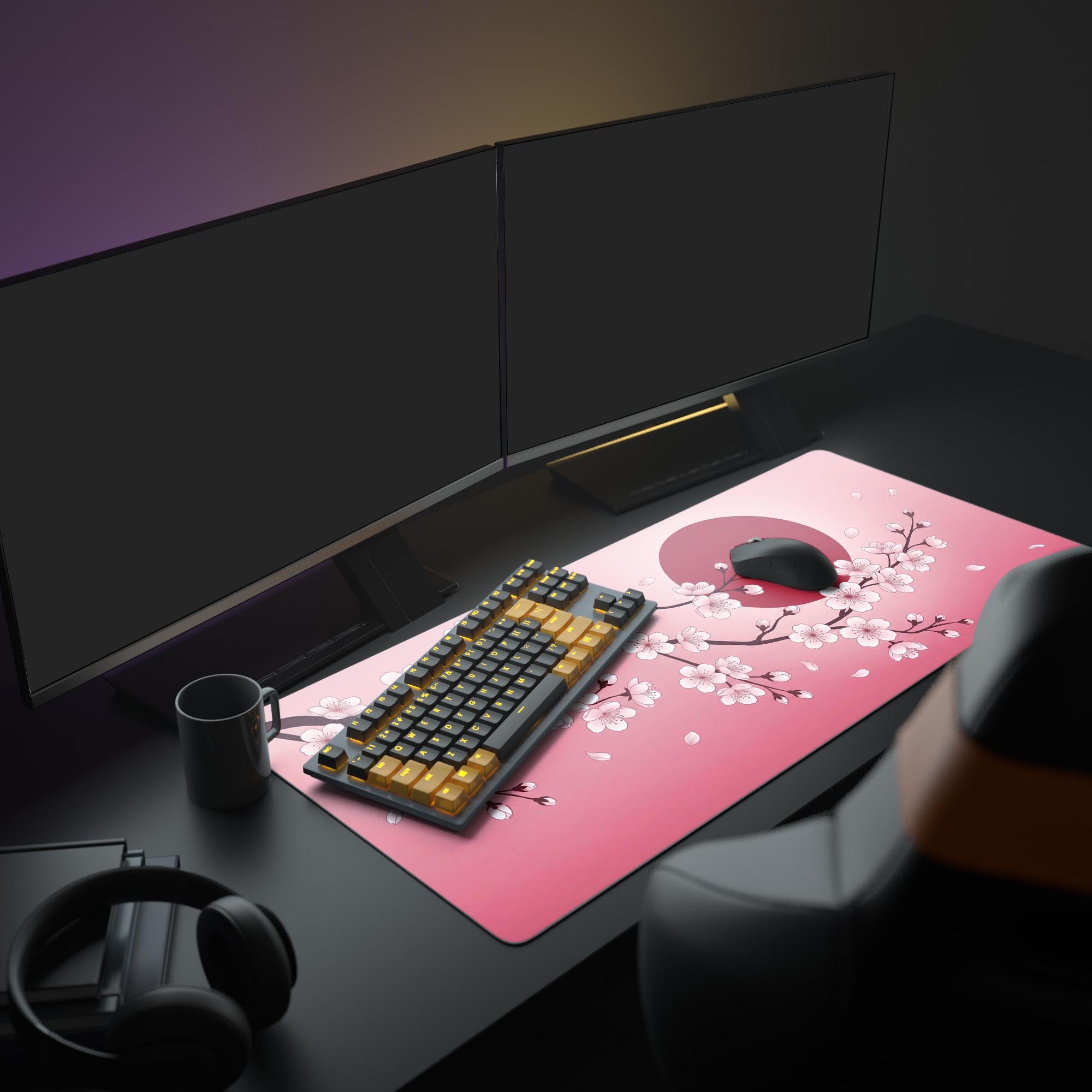 A complete gaming setup featuring the Sakura Dawn XL Mouse Pad, with a monitor and illuminated keyboard, creating a serene pink Japanese aesthetic. - Epic Design Pads & Mousepads