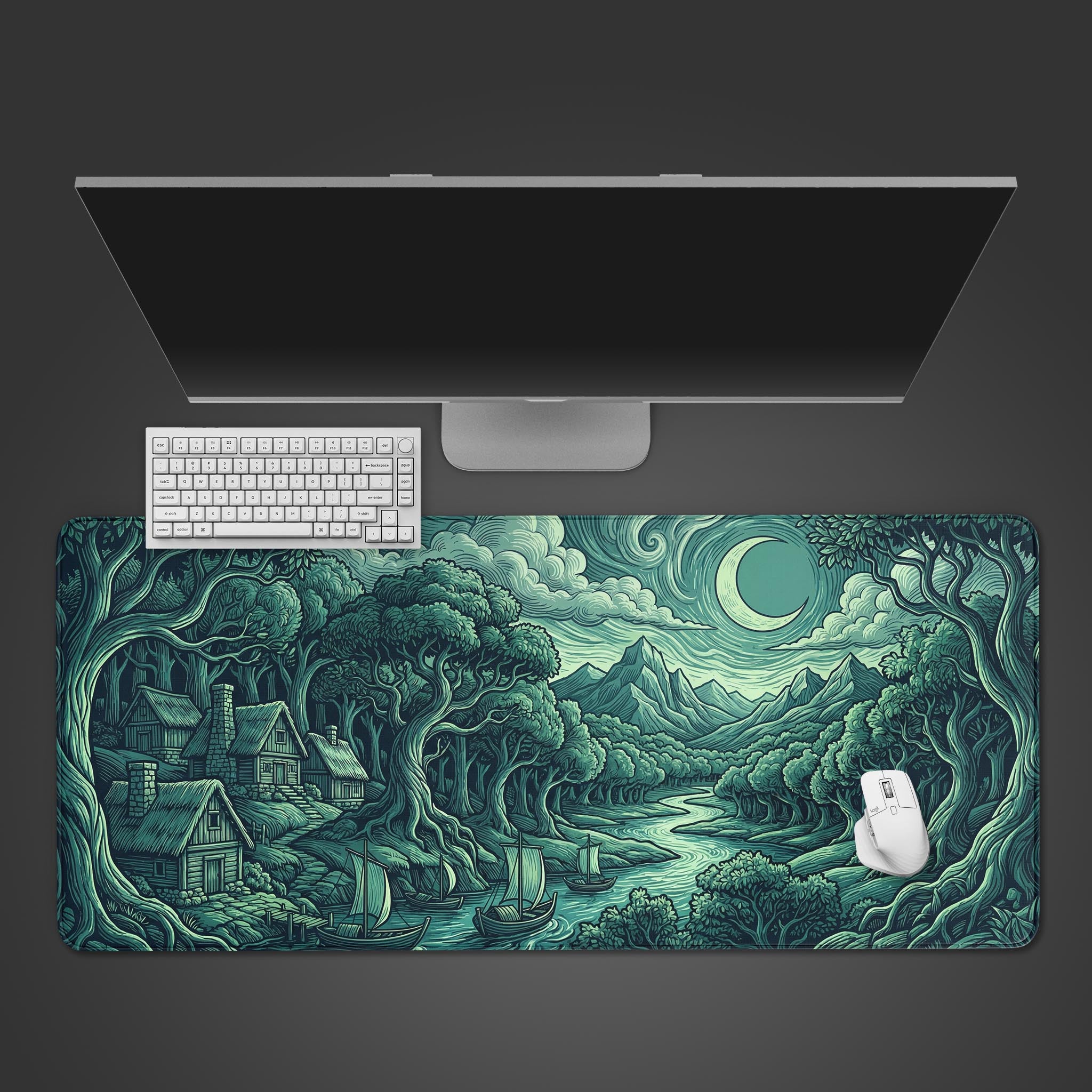 Top-down view of the Silent Departure gaming desk mat, featuring a fantasy forest design, shown with a white keyboard and mouse on a dark surface. - Epic Design Pads & Mousepads