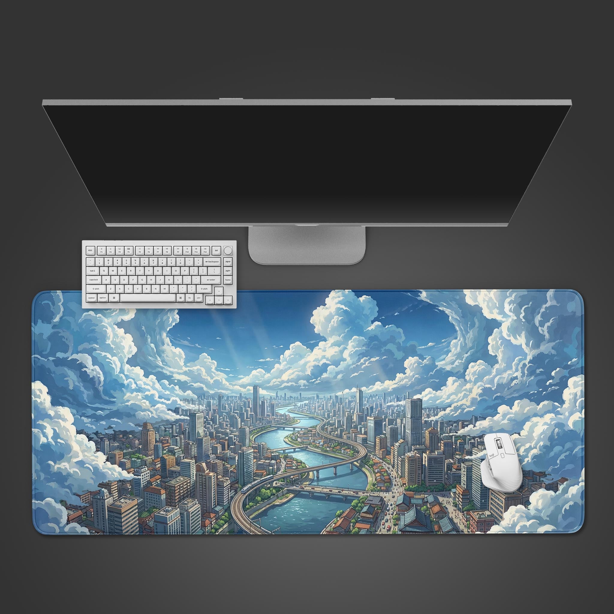 A top-down view of the Skybound City gaming desk mat, featuring its anime cityscape art beneath a sleek monitor, white keyboard, and mouse. - Epic Design Pads & Mousepads
