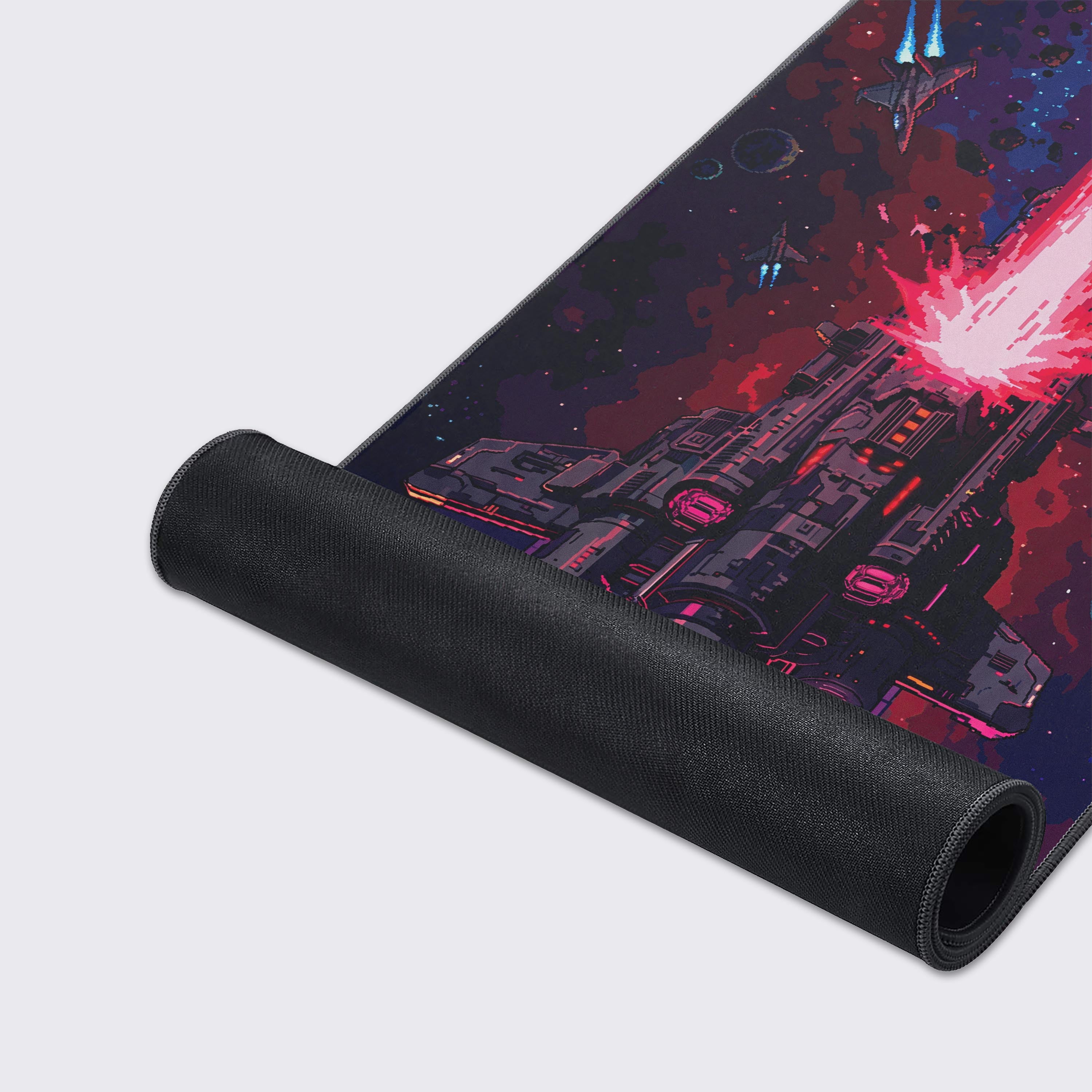 Waterproof and non-slip features of the pixel art spaceship desk pad with feature icons highlighted.