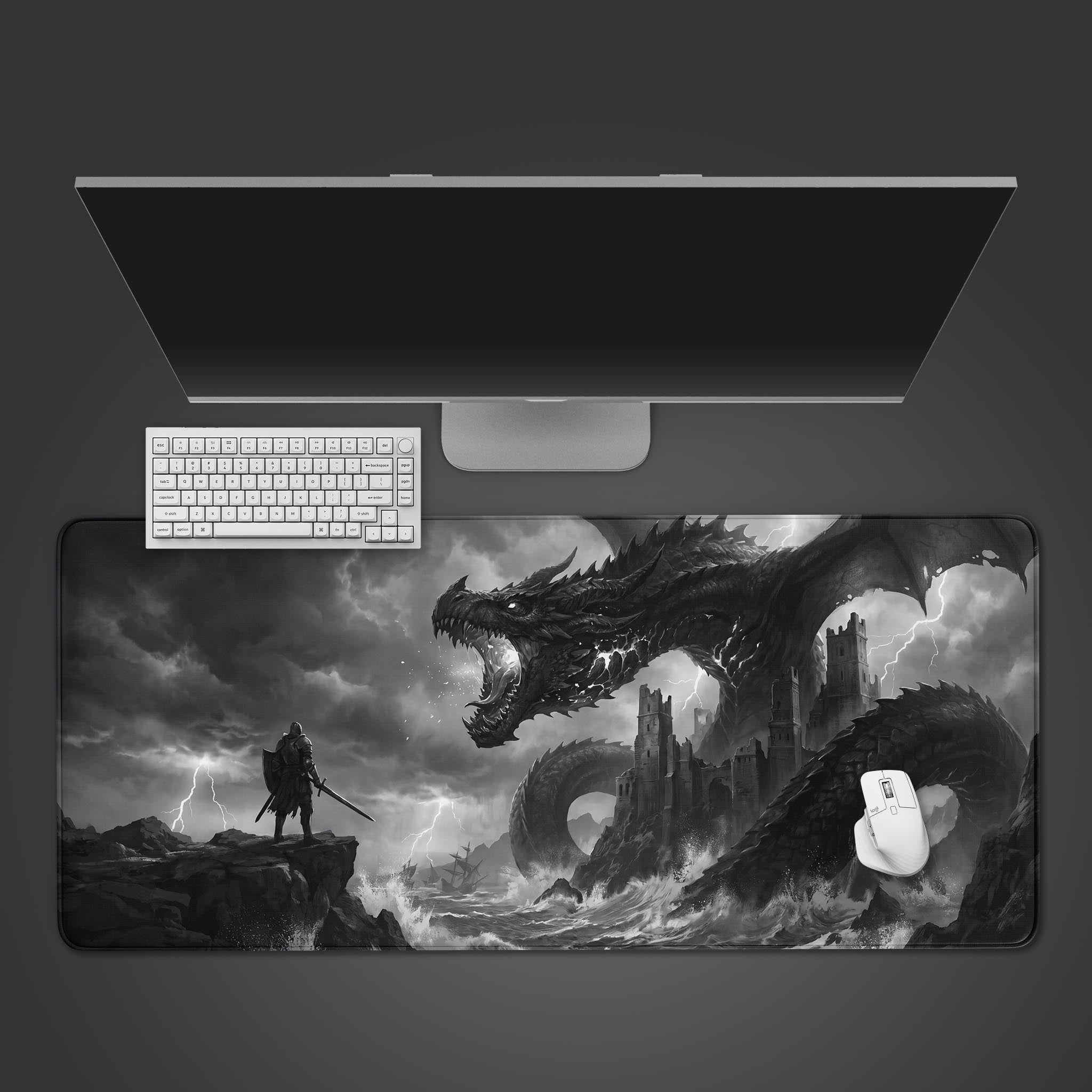 Epic grayscale dark fantasy desk mat featuring a giant dragon roaring at a lone knight on a cliffside