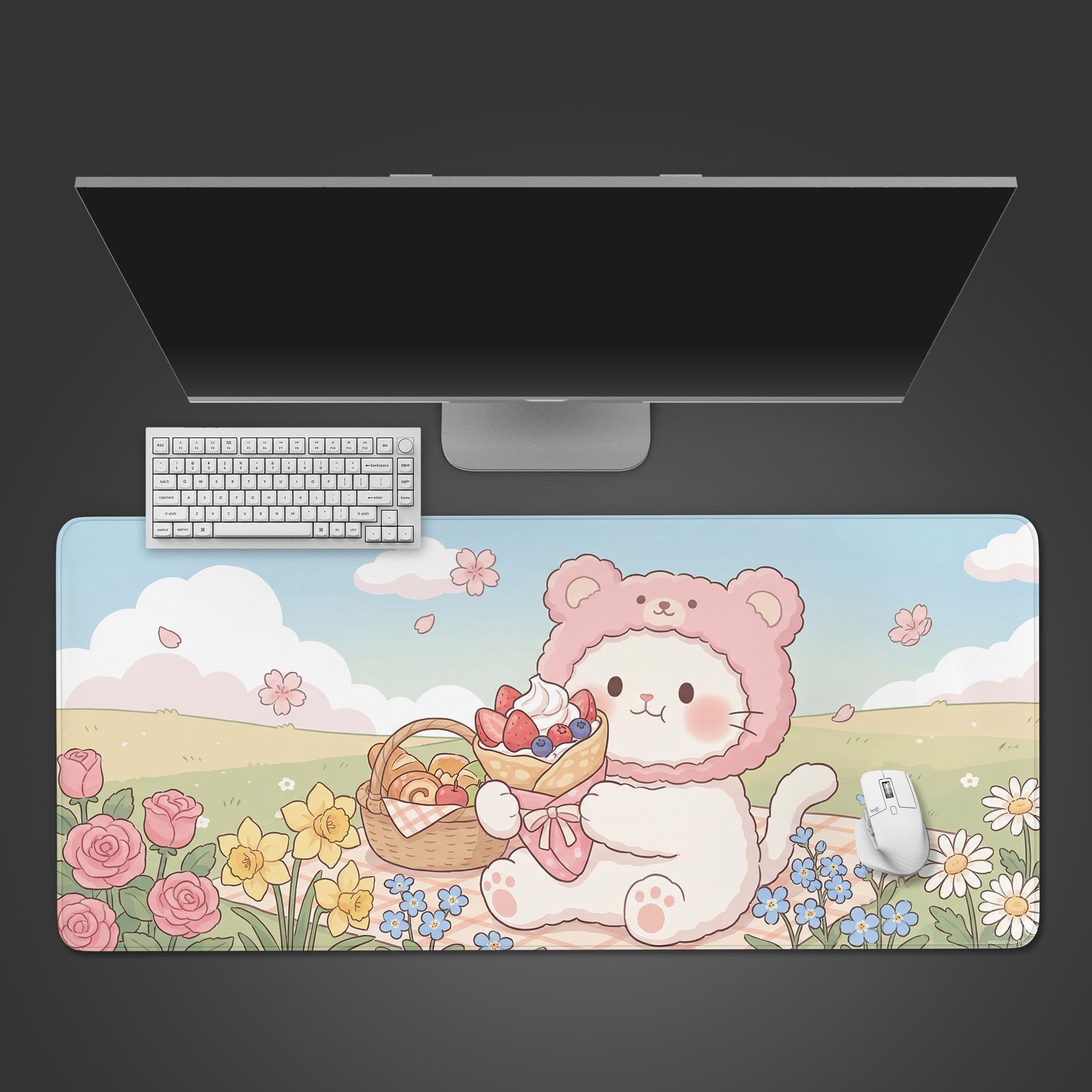 A top-down view of the Sweet Spring Picnic gaming desk mat, featuring a cute cat design, with a white keyboard and mouse neatly arranged on top. - Epic Design Pads & Mousepads
