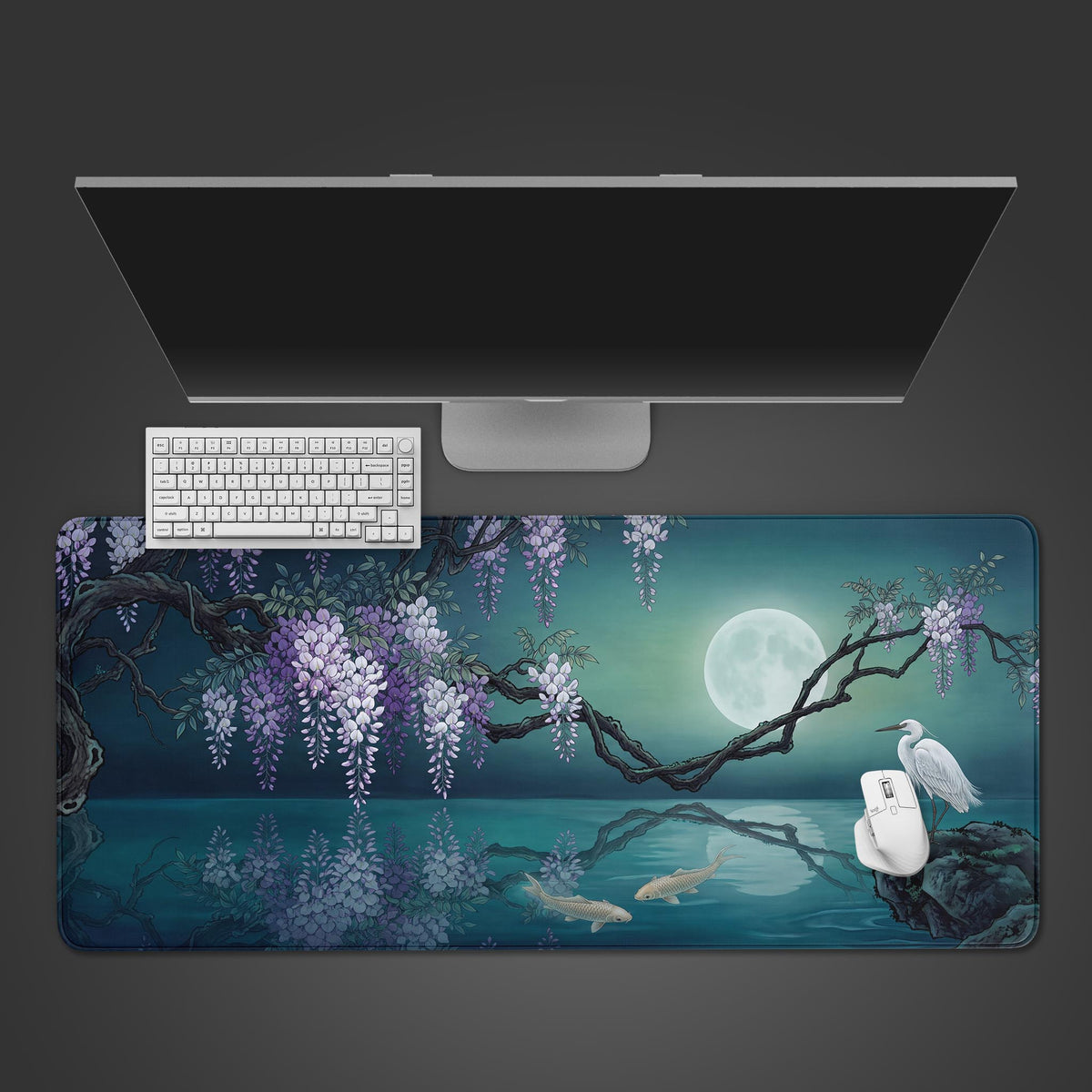 Teal floral chinese ink desk mat from above under a white keyboard and mouse, with wisteria, full moon, egret and carp.