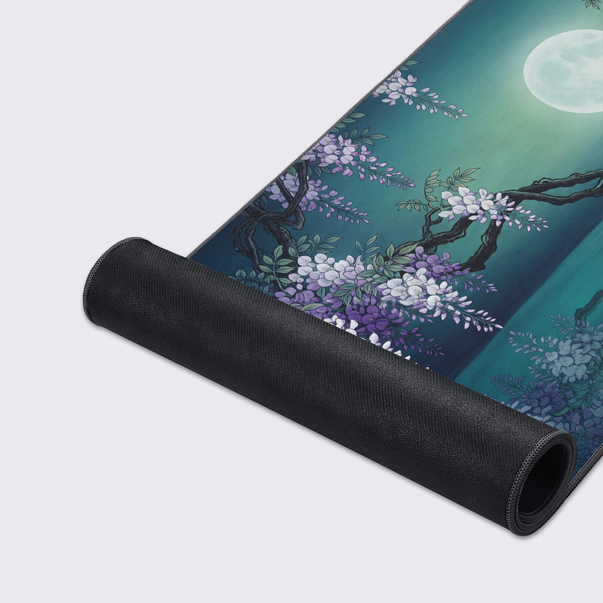 The mat rolled up from one end, showing its black rubber underside below purple wisteria and a glowing full moon.