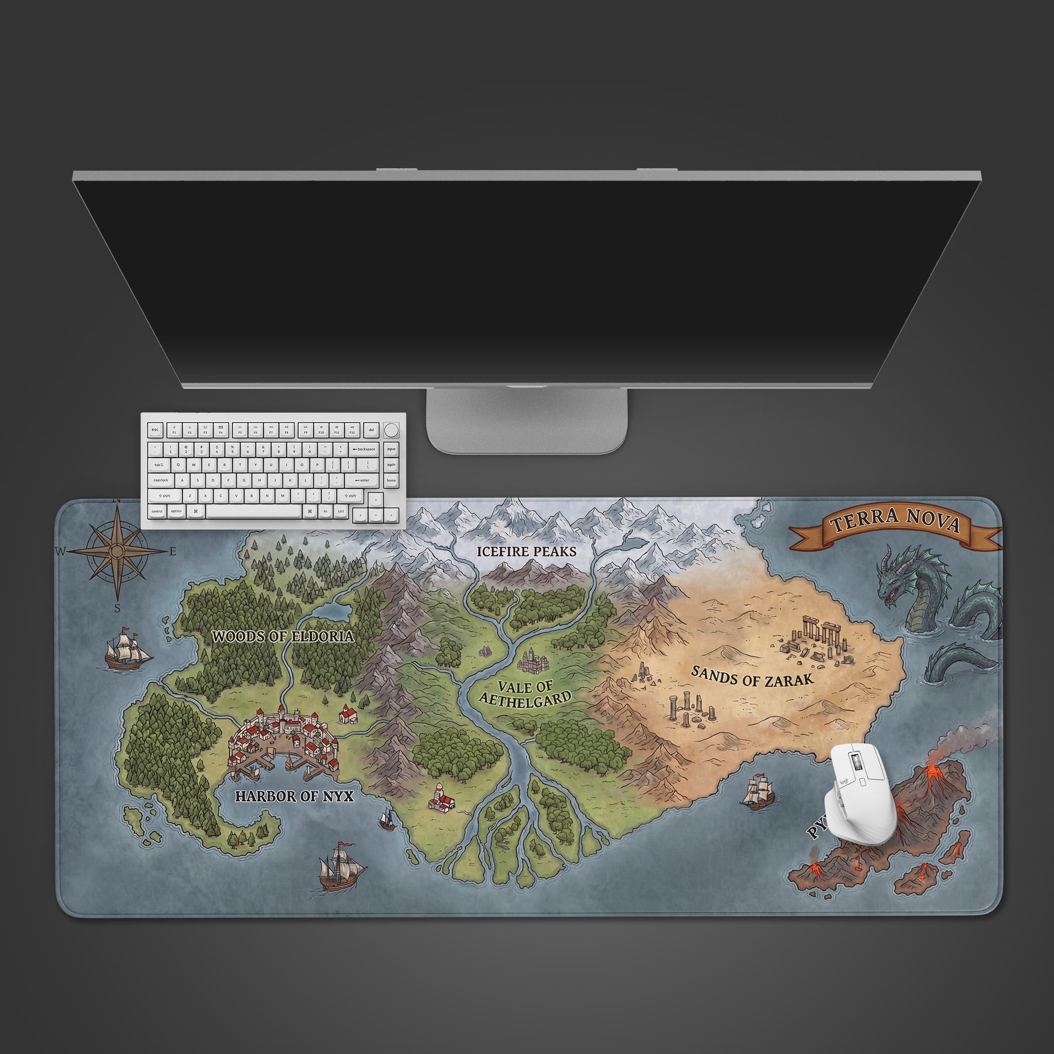A top-down view of the Terra Nova fantasy map gaming desk mat, with a white keyboard and monitor creating a clean, organized workspace. - Epic Design Pads & Mousepads