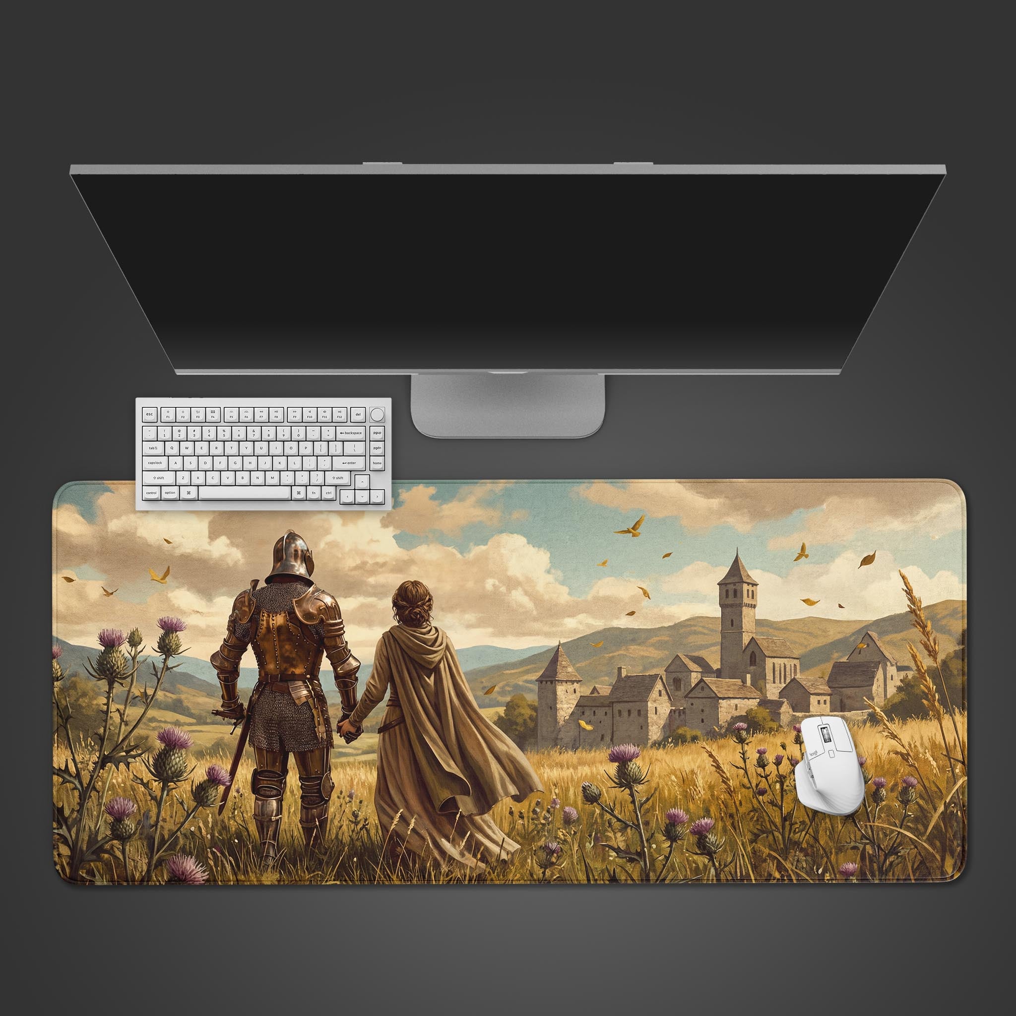 The Homecoming fantasy gaming desk mat shown from above with a white keyboard and mouse, depicting a knight and lady walking toward a castle. - Epic Design Pads & Mousepads