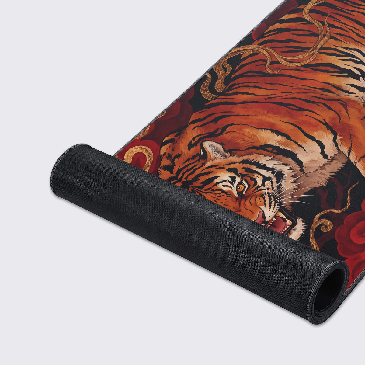 Detail of the golden magical smoke and faded ghost tiger in the background of the dark crimson desk mat.