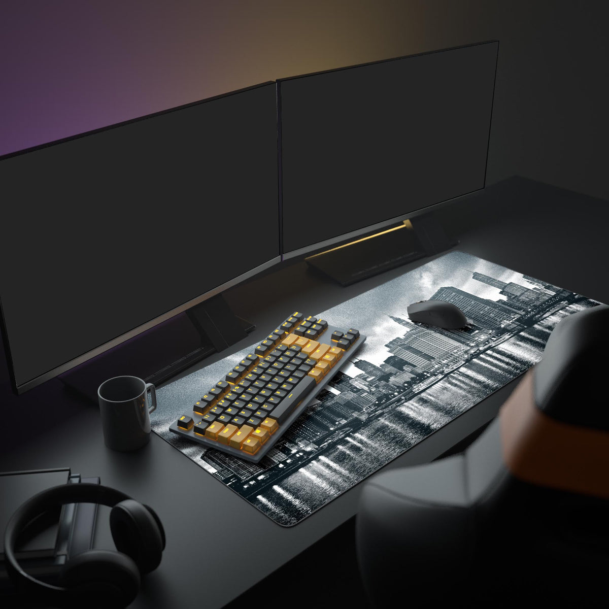 Large black and white desk mat with monochrome city skyline, shown in a professional minimalist setup with dual monitors and headphones. - Epic Design Pads & Mousepads