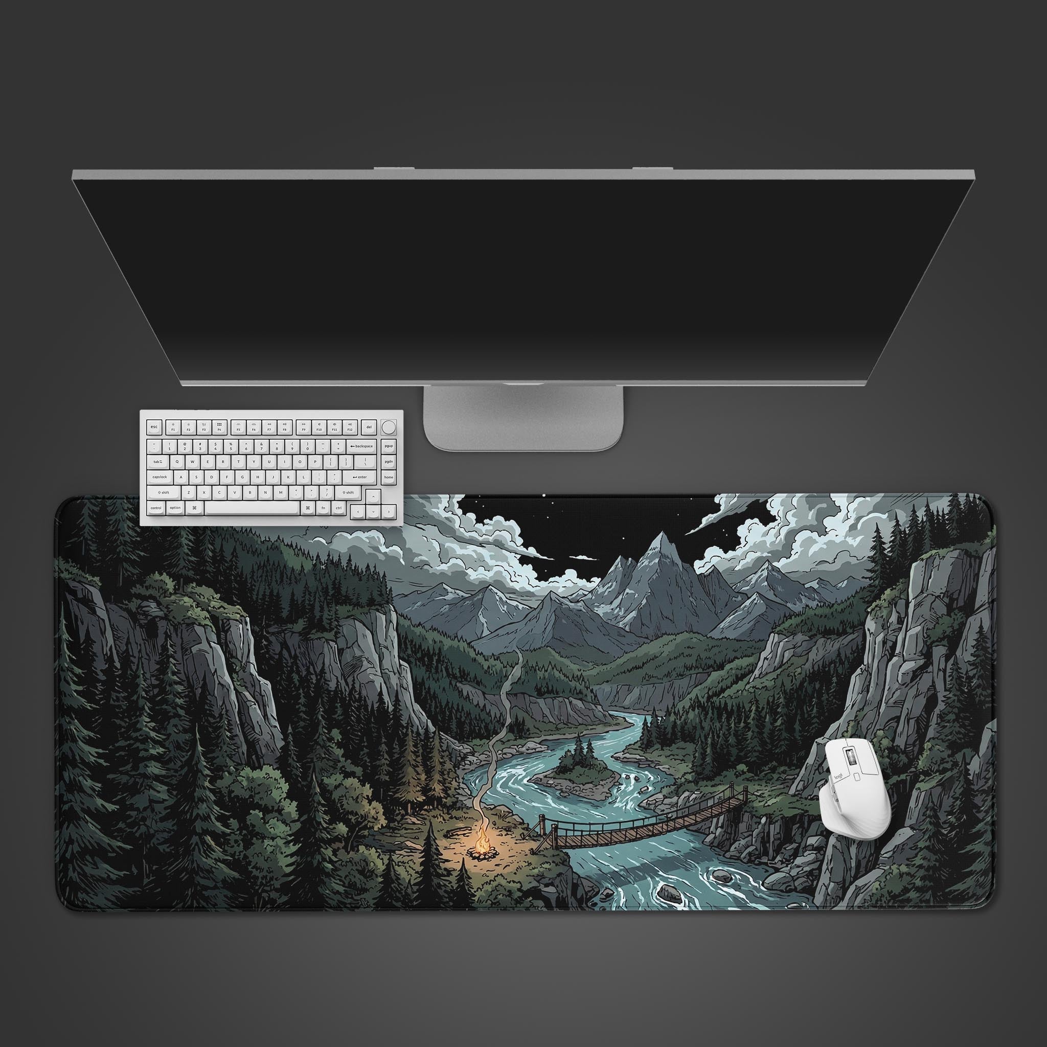 Top-down view of the Valley Campfire gaming desk mat, showing the mountain river art with a white keyboard and mouse on a dark background. - Epic Design Pads & Mousepads